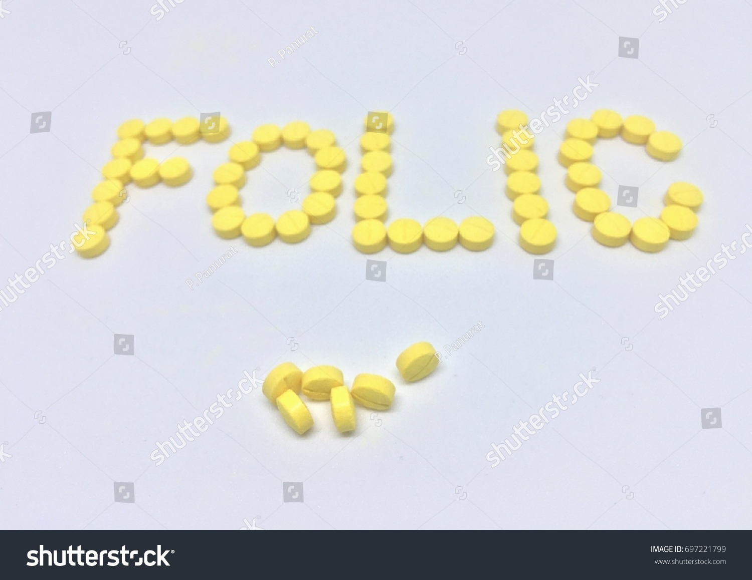 Folic Acid Tablets on White Background  #697221799