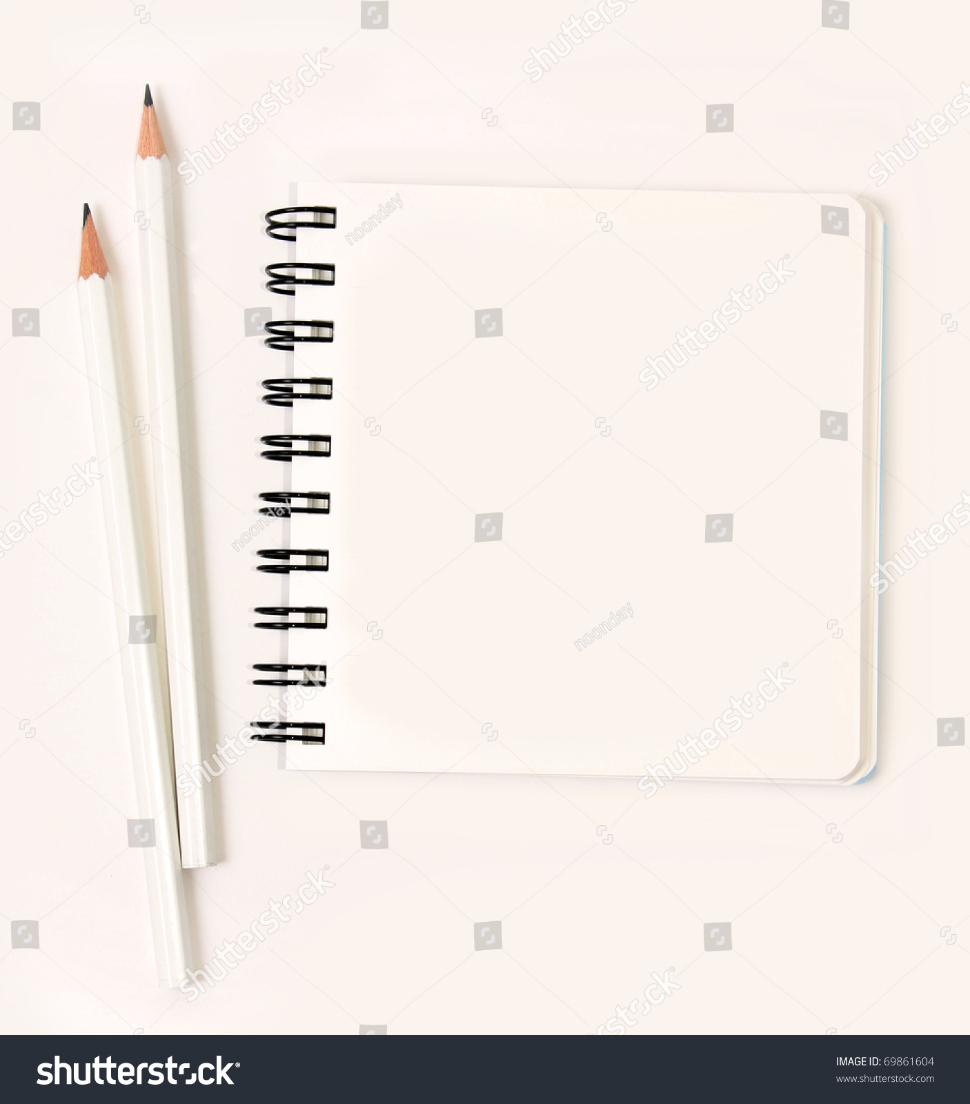 square notebook with white pencils #69861604