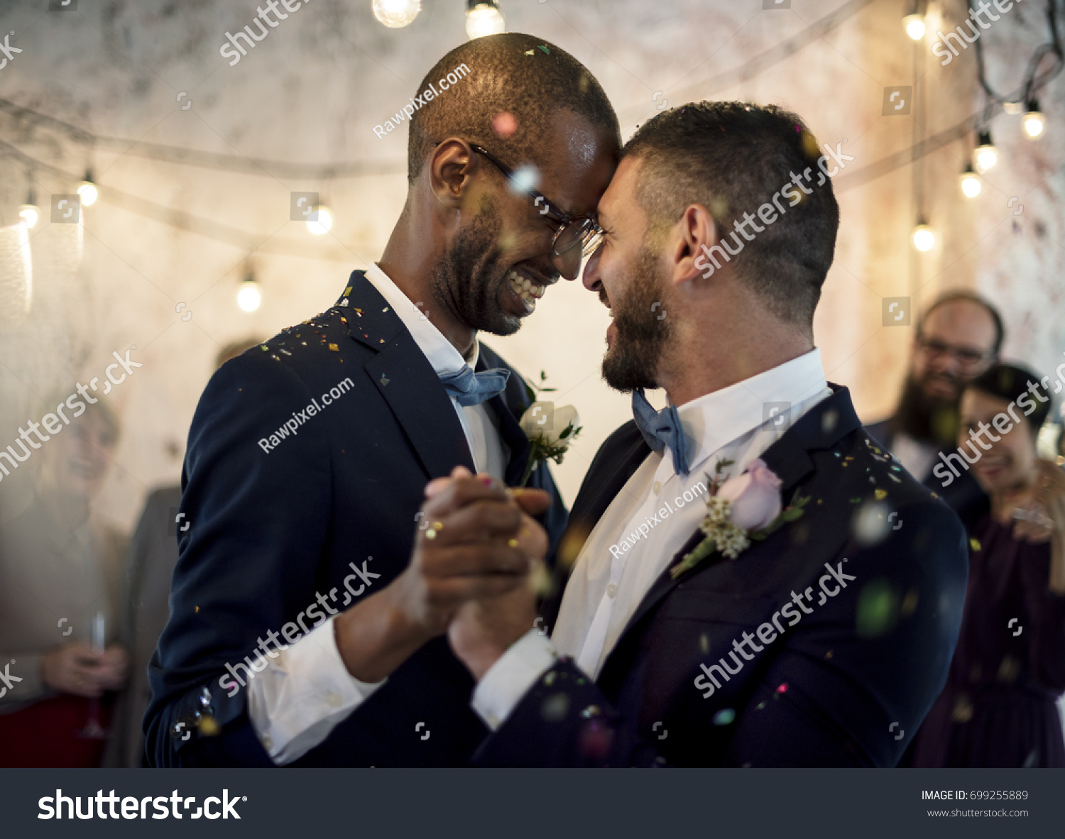 Closeup of Newlywed Gay Couple Dancing on Wedding Celebration #699255889