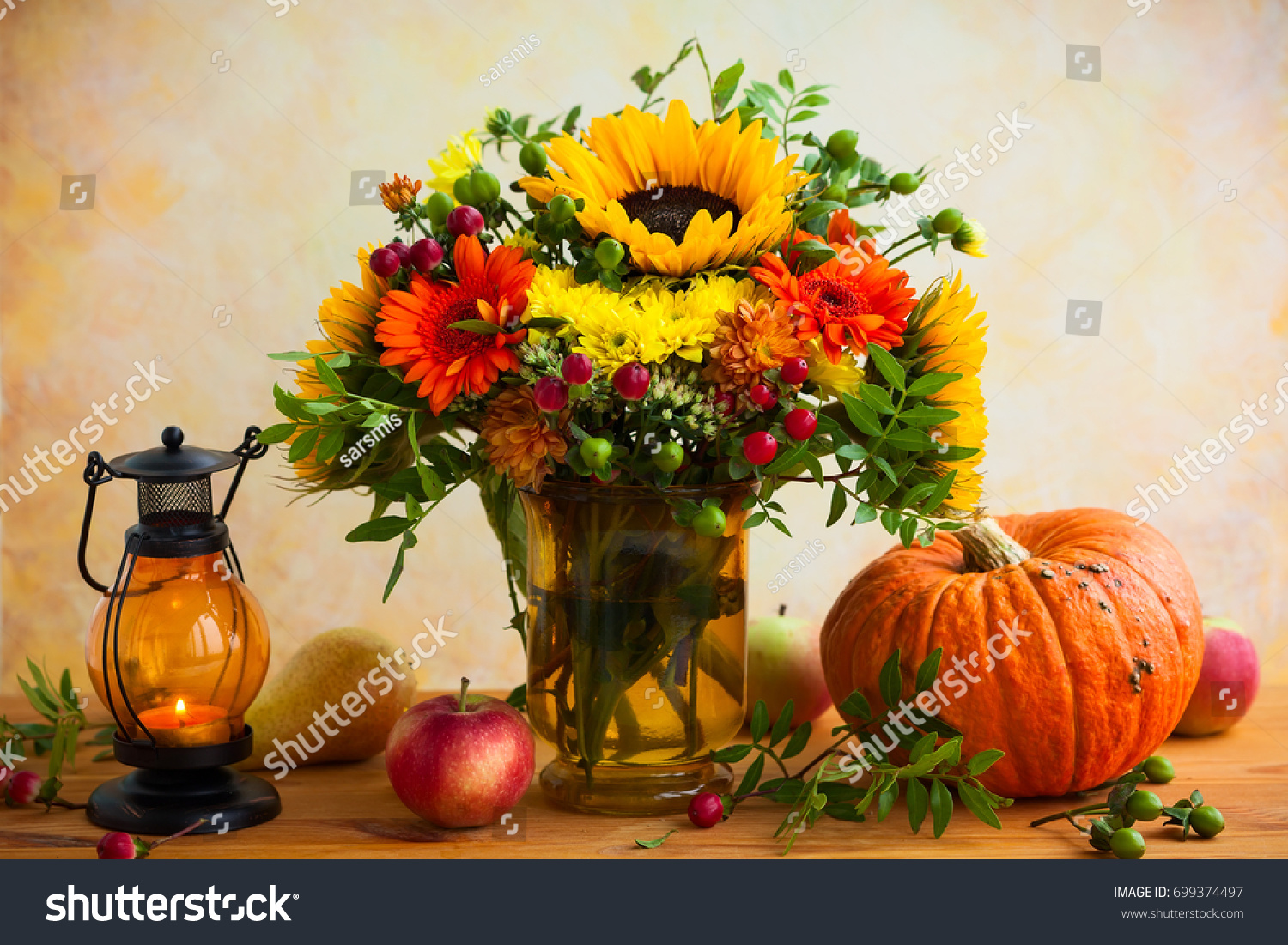 Autumn still life with flowers, pumpkin and fruits #699374497