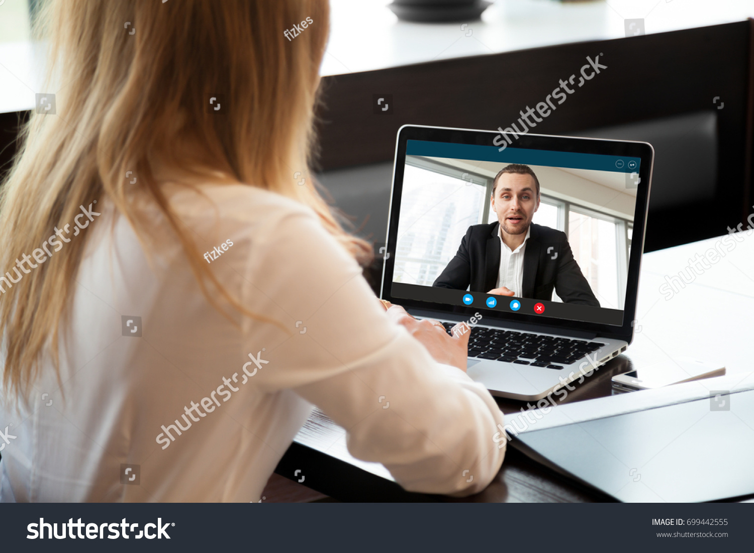 Businesswoman making video call to business partner using laptop, looking at screen with virtual web chat, contacting client by conference, talking on webcam, online consultation, hr concept, close up #699442555