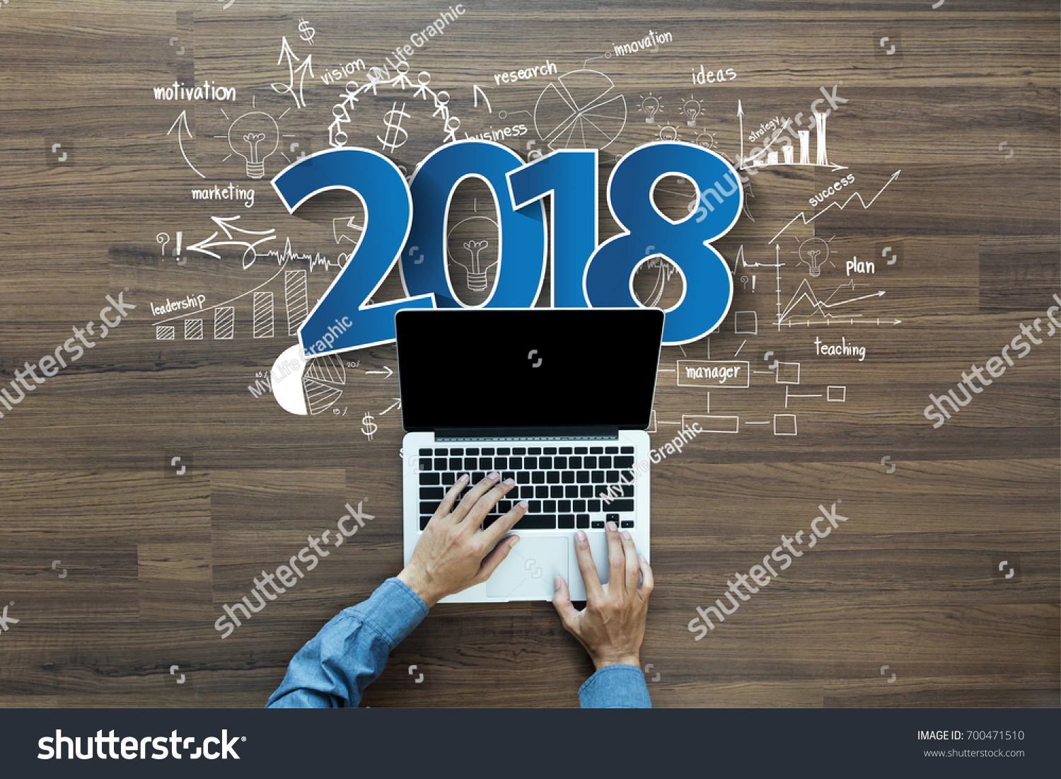 2018 new year business success, Creative thinking drawing charts and graphs strategy plan ideas wooden table background, Inspiration concept with businessman working on laptop computer PC, Top View #700471510