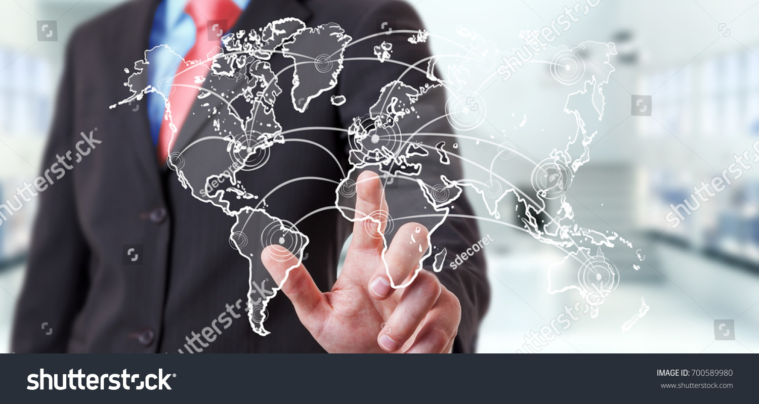 Businessman on blurred background touching world connection sketch #700589980