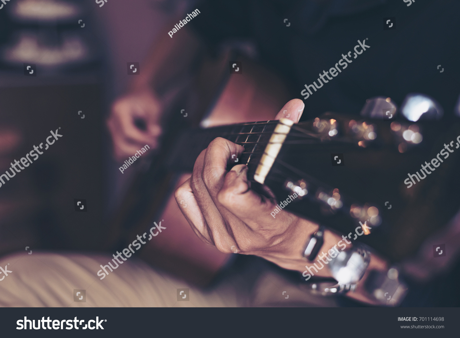 Acoustic Guitar Playing. Men Playing Acoustic Guitar,Closeup Photo,Vintage filter #701114698