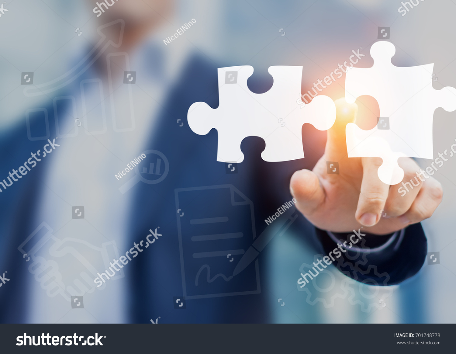 Mergers and acquisition concept with consultant touching icons of puzzle pieces representing the merging of two companies or joint venture, partnership #701748778