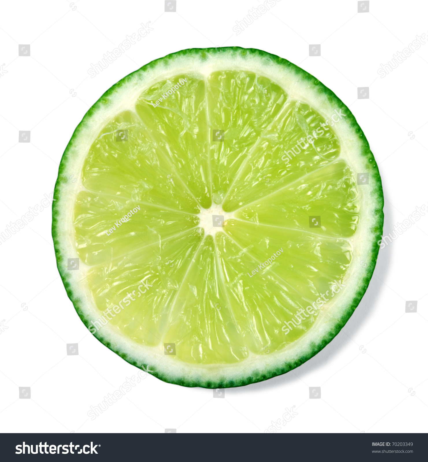 Slice of fresh lime isolated on white background #70203349