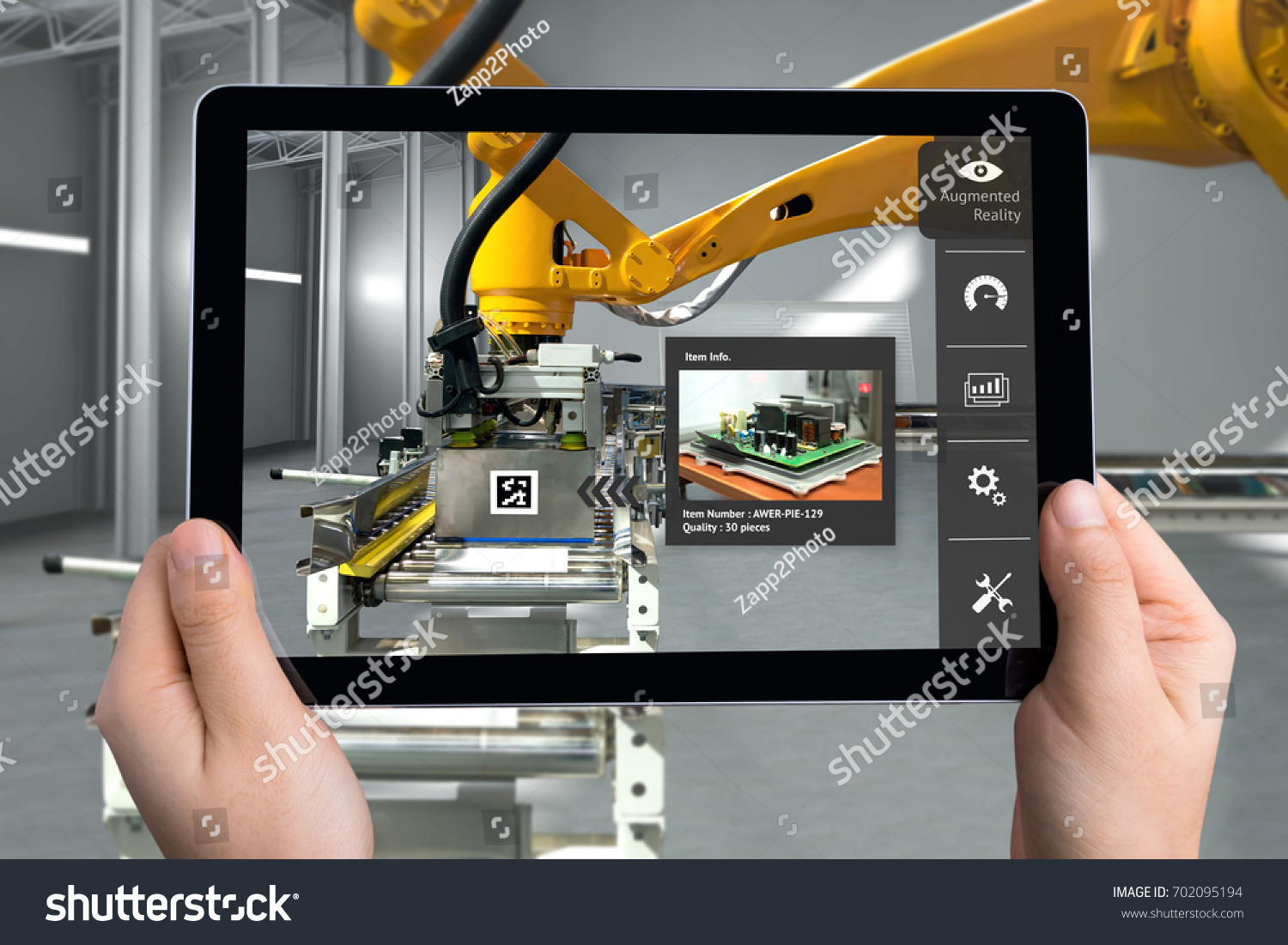 Smart Logistic warehouse technology , Augmented reality marketing , X-Ray packages box , industry 4.0 concept. Hand holding tablet to check items inside boxes. #702095194