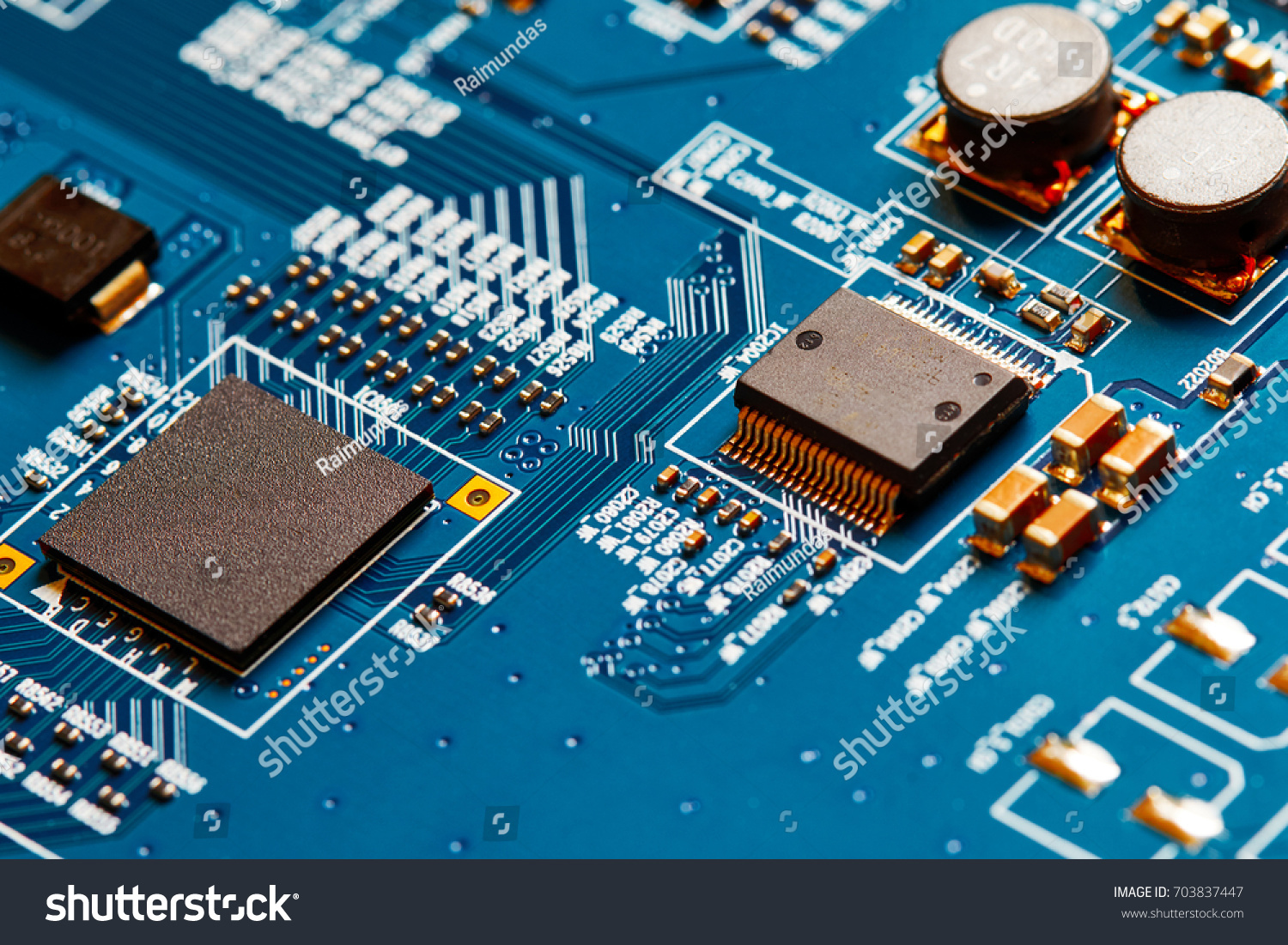 Electronic circuit board close up. #703837447