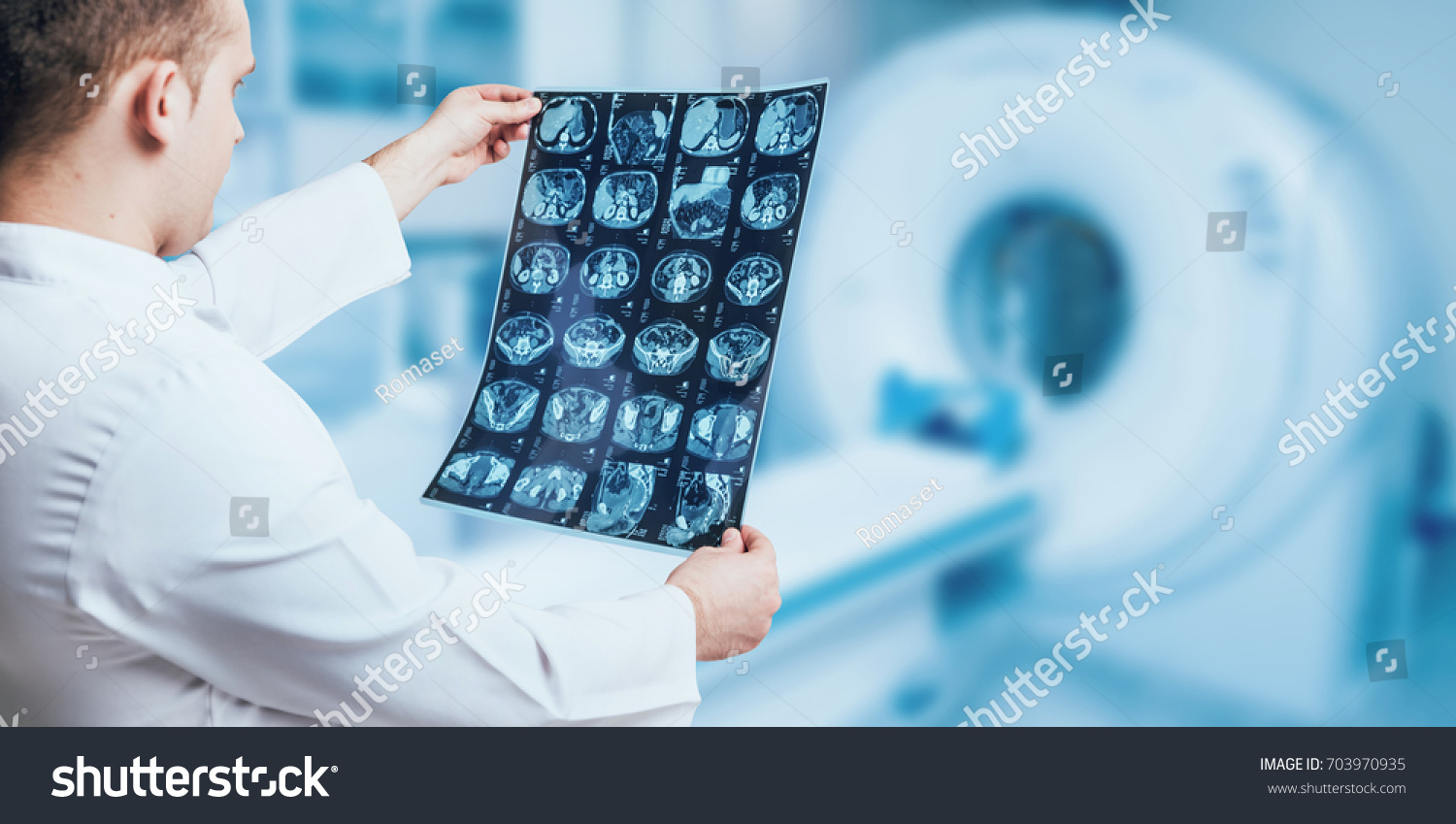 Doctor examine MRI picture. Medical equipment. #703970935
