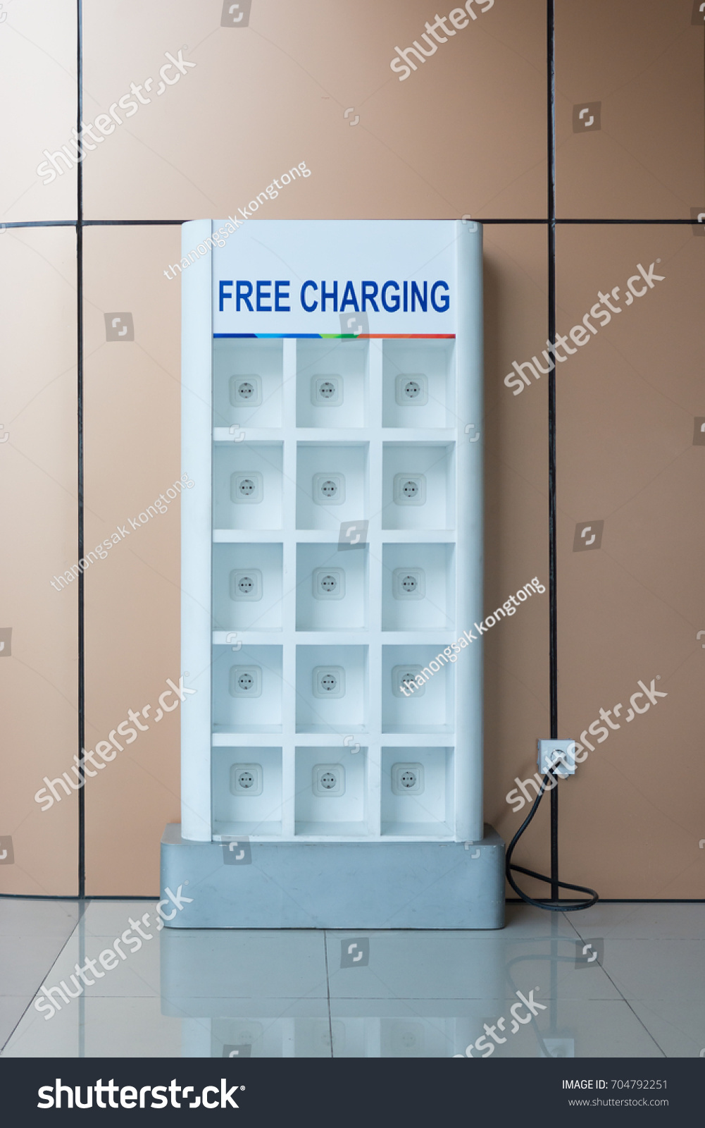 free battery charging station in the airport  #704792251