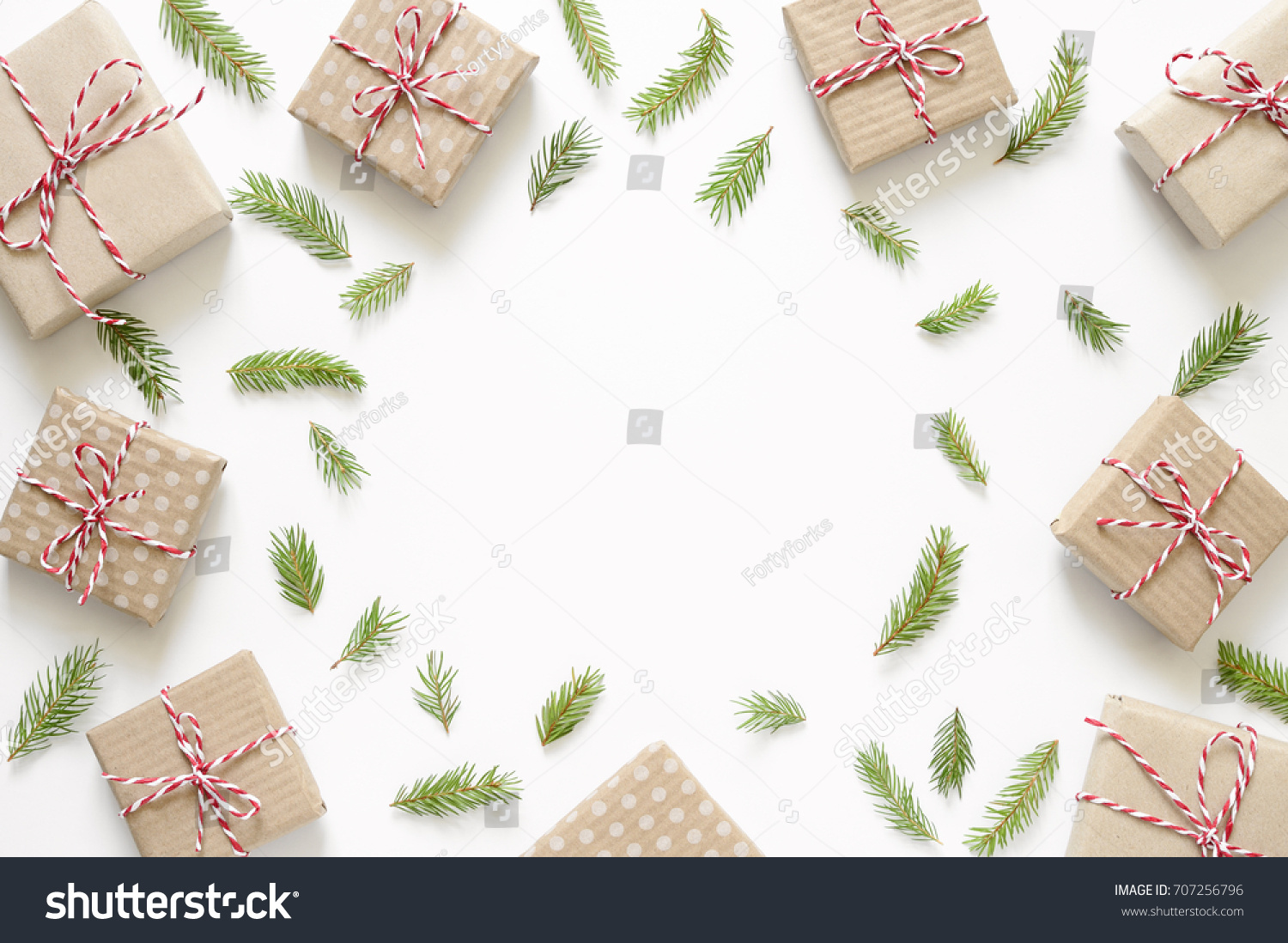 Christmas simple background with simple paper wrapped presents put around, flat lay, view from above, space for a text #707256796