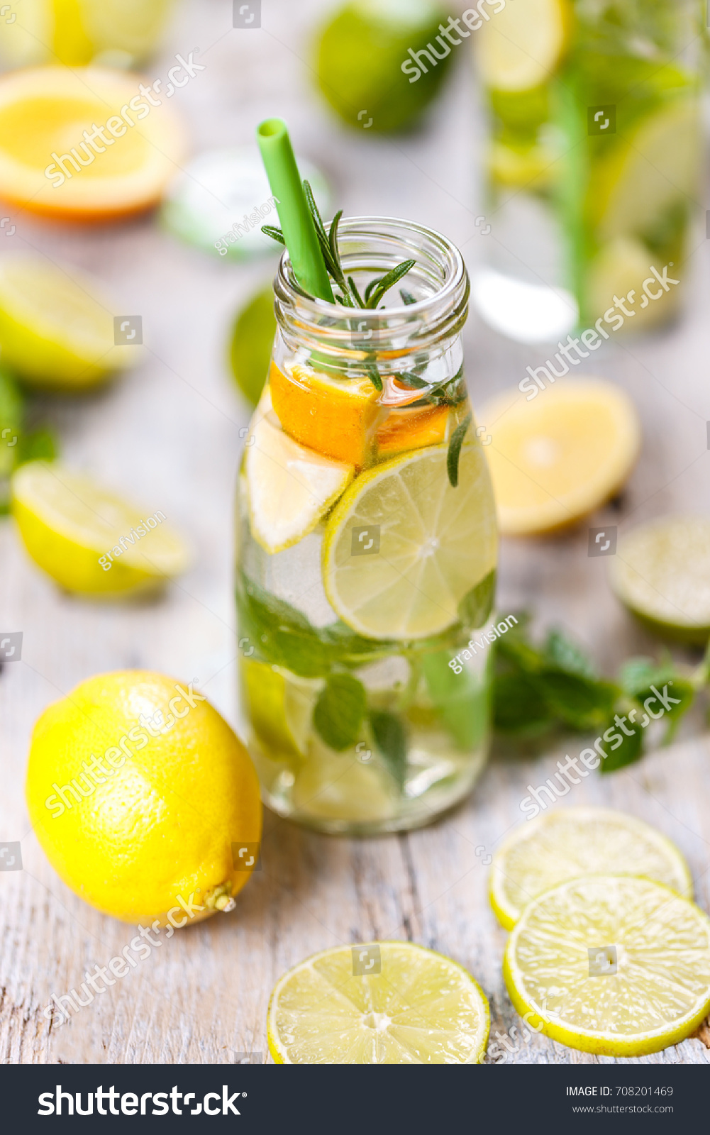 Lemon water in glass bottle. Healthy detox concept #708201469