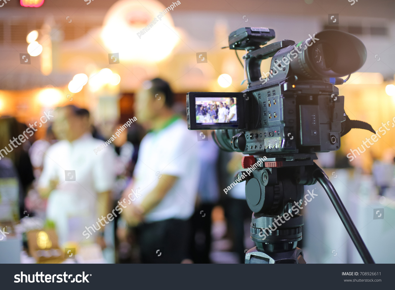 close-up of video camera fliming event #708926611