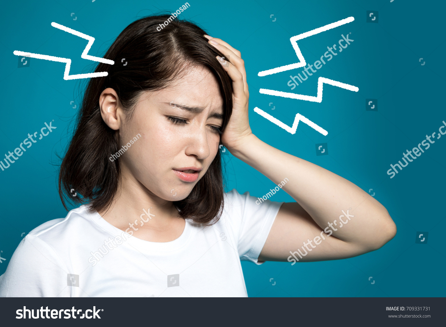 young woman having a headache. #709331731