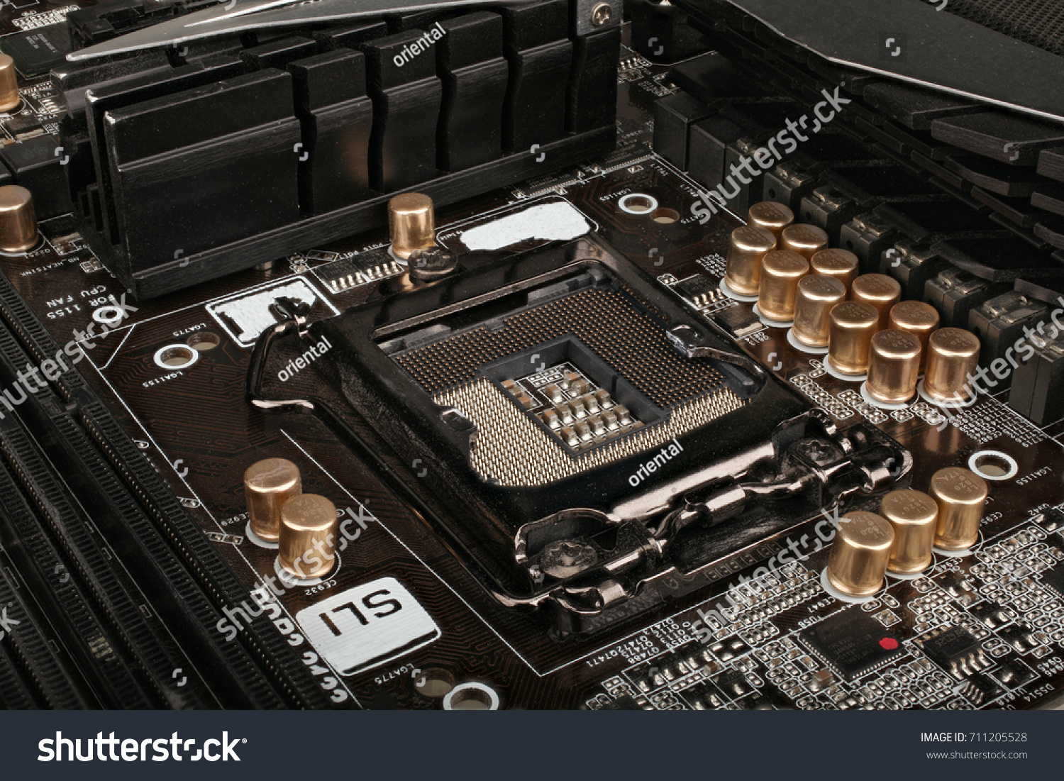 close view at empty processor socket on computer motherboard. #711205528