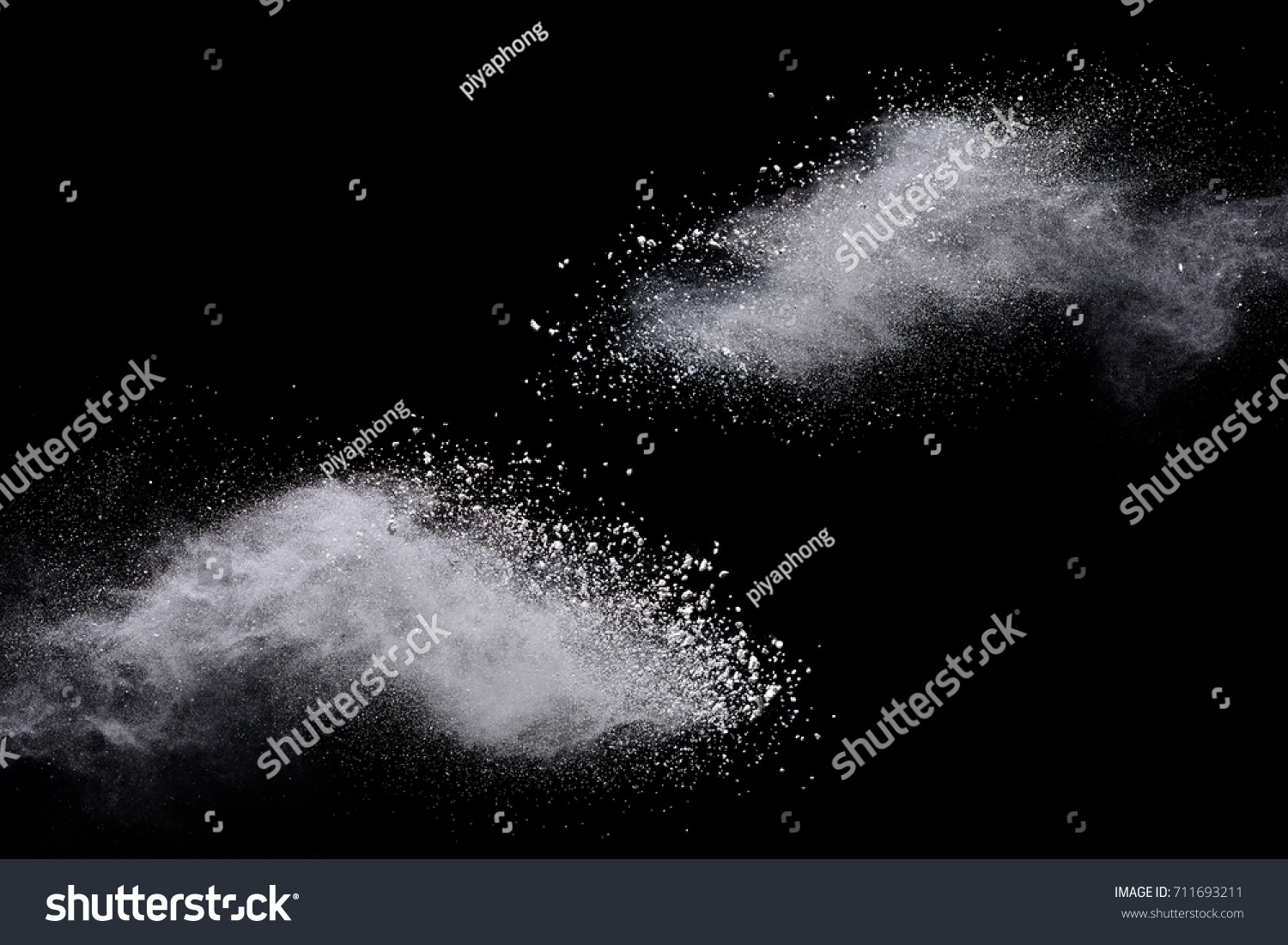 White powder explosion on black background. Colored cloud. Colorful dust explode. Paint Holi. #711693211