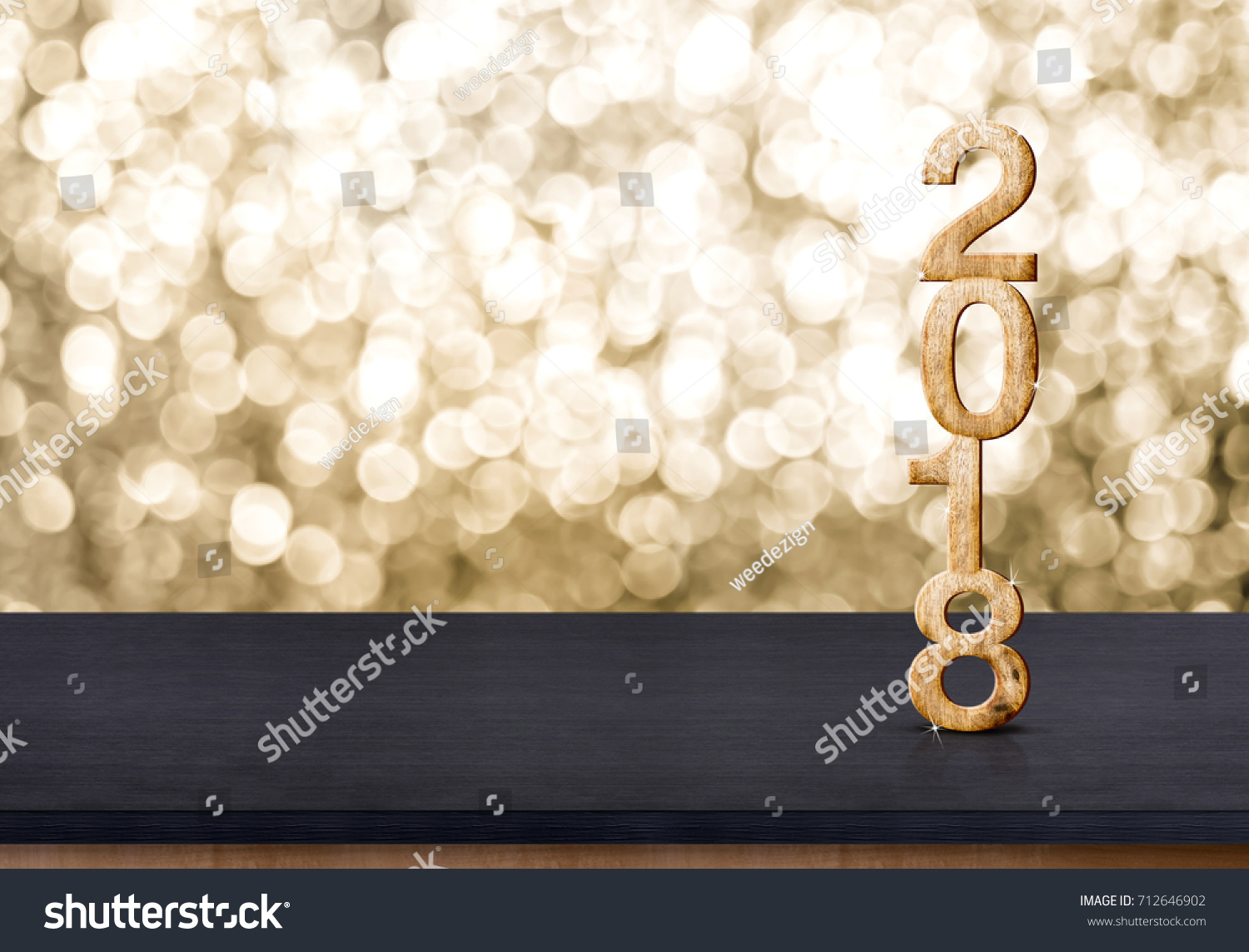2018 new year wood number on wood table with sparkling gold bokeh wall,panoramic banner for display or montage of product #712646902