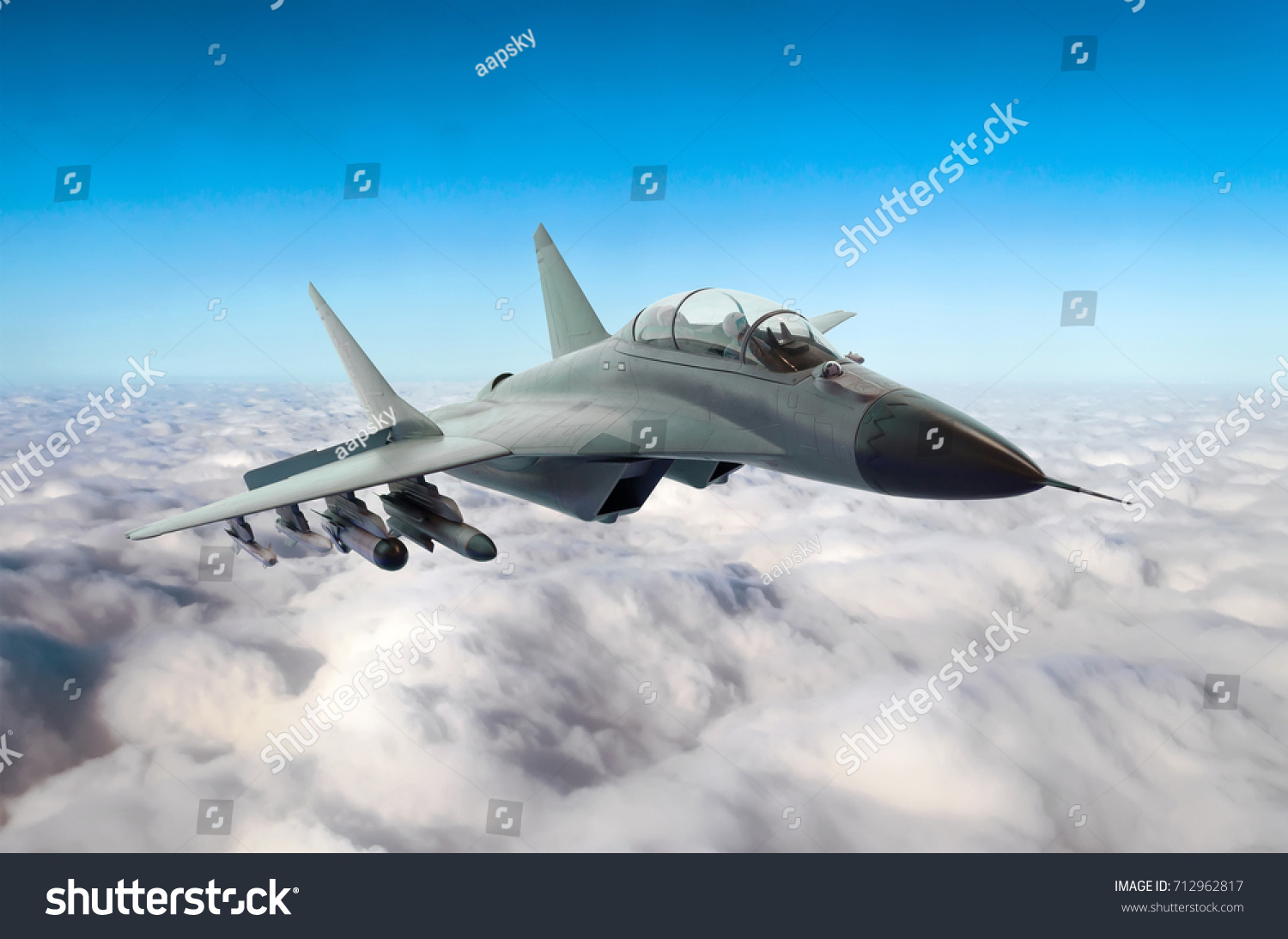 Military fighter jet flies in the sky above the clouds #712962817