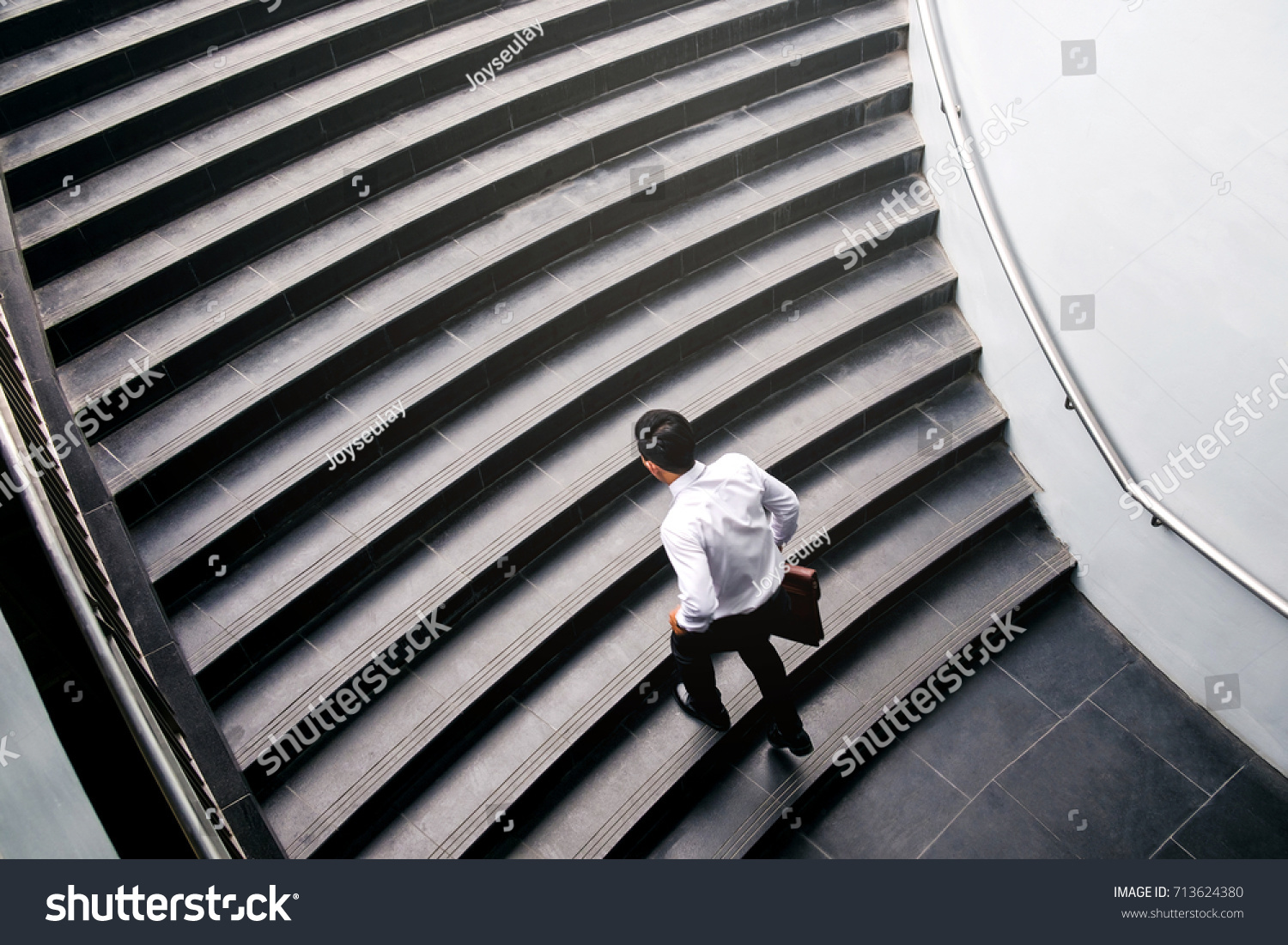 Businessman running fast upstairs Growth up Success concept #713624380