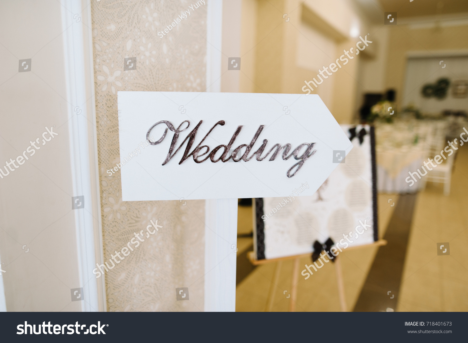 Wedding. Wedding decor. Wooden plaque with the inscription Wedding. #718401673