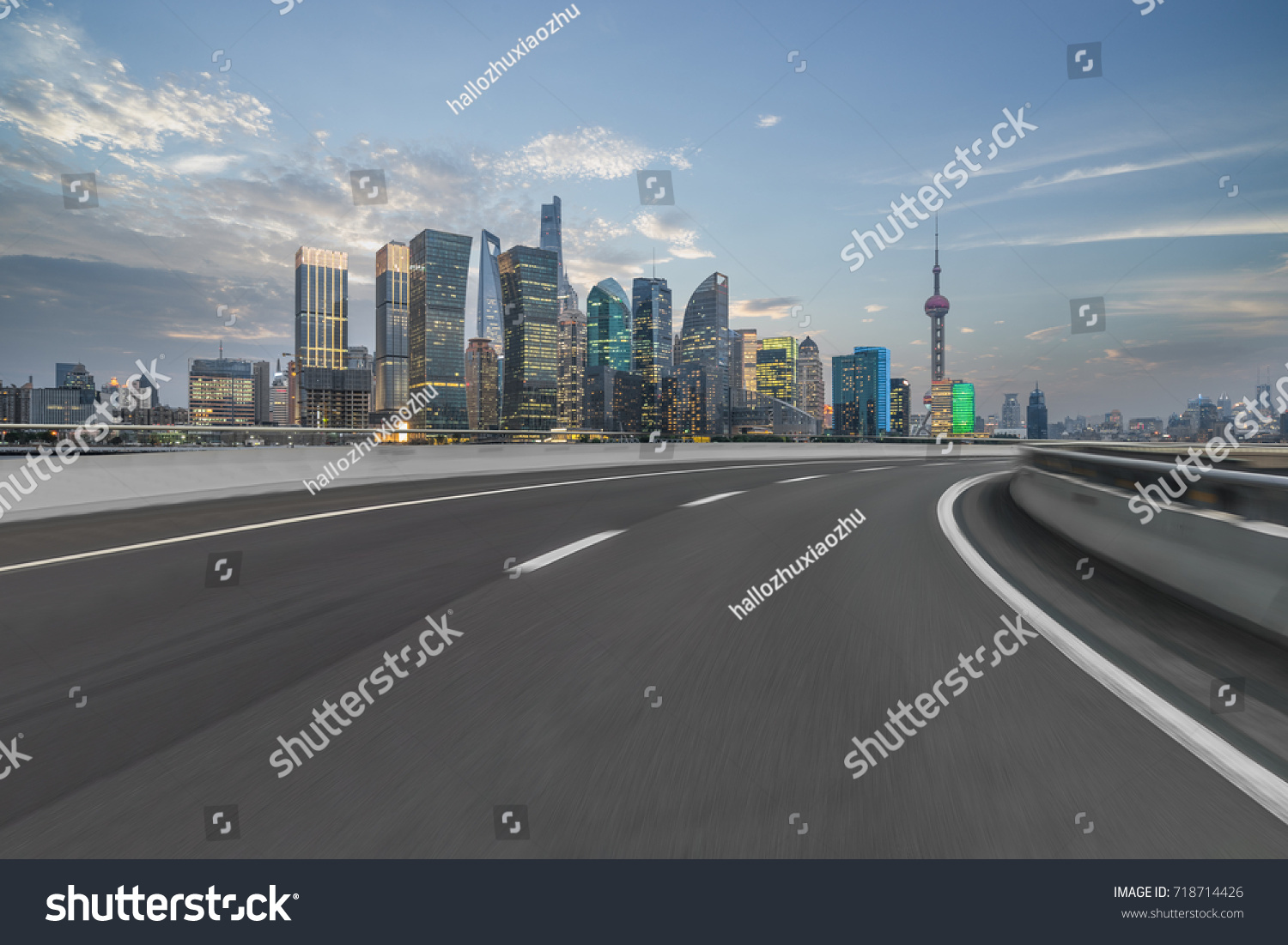 cityscape and skyline of shanghai from empty asphalt road #718714426