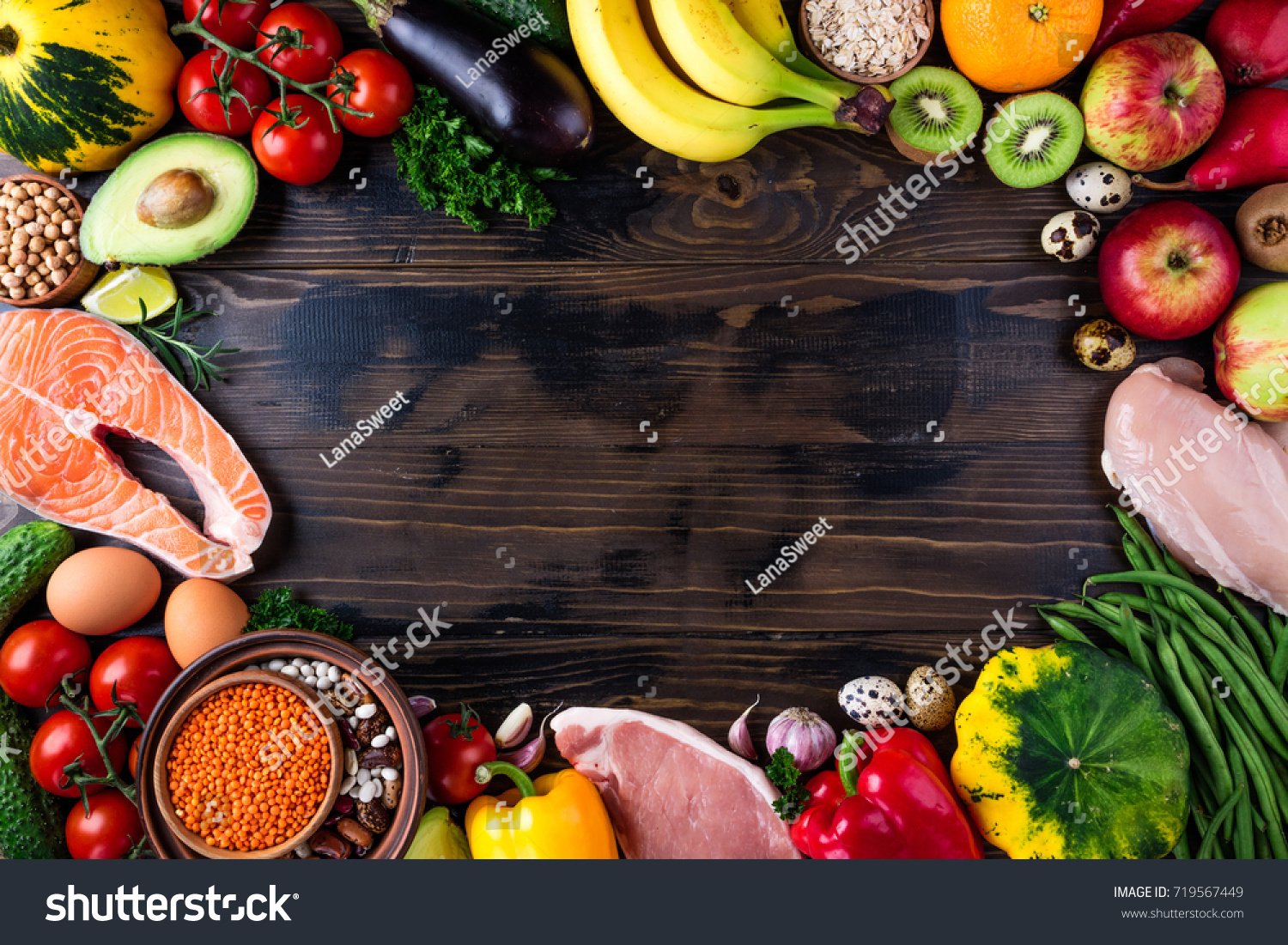 Selection of healthy food. Fresh organic vegetables, fruits, meat and fish. Healthy eating and healthy life concept. Top view, copy space #719567449