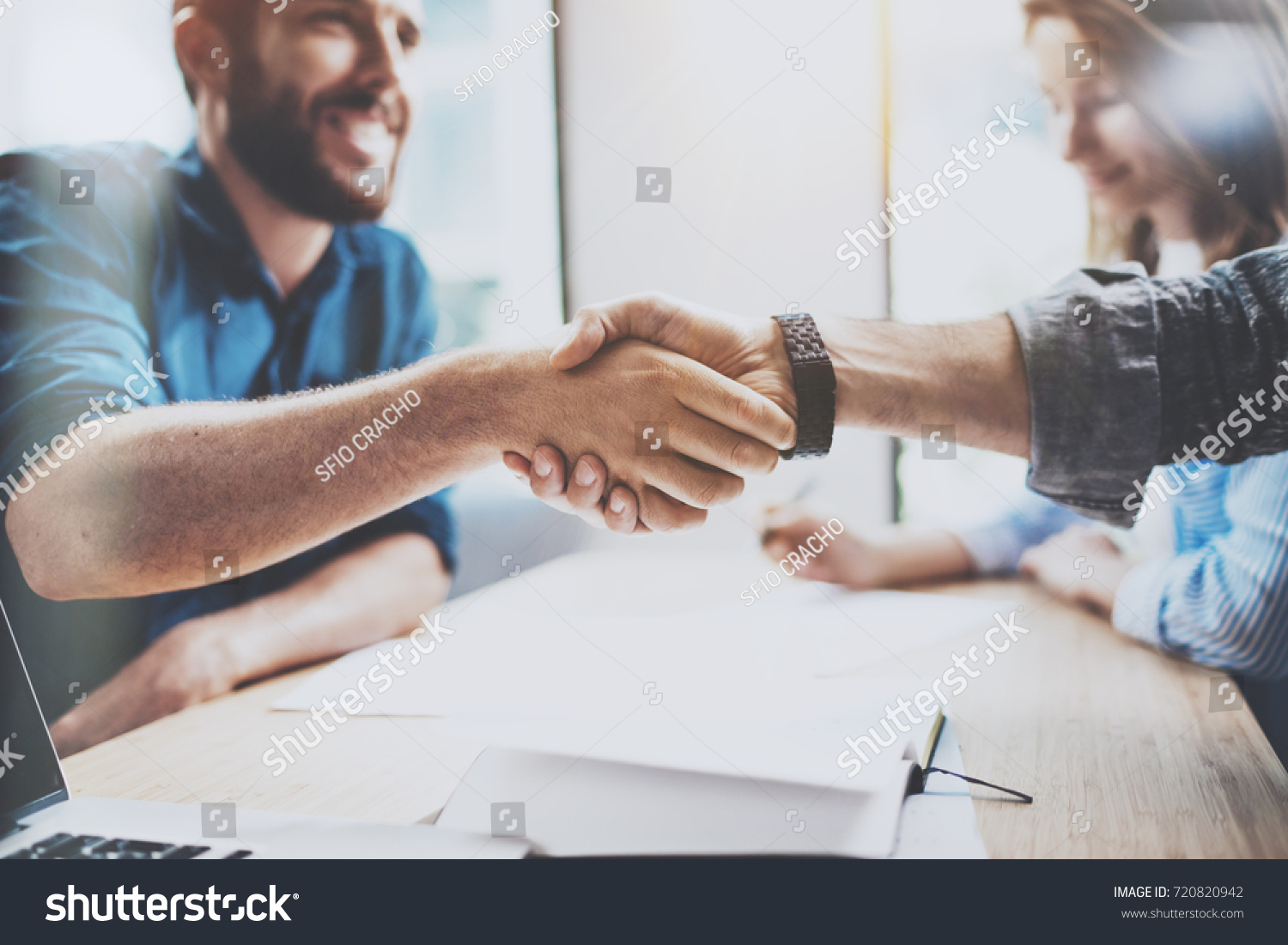 Business male partnership handshake concept.Photo two mans handshaking process.Successful deal after great meeting.Horizontal, blurred background #720820942