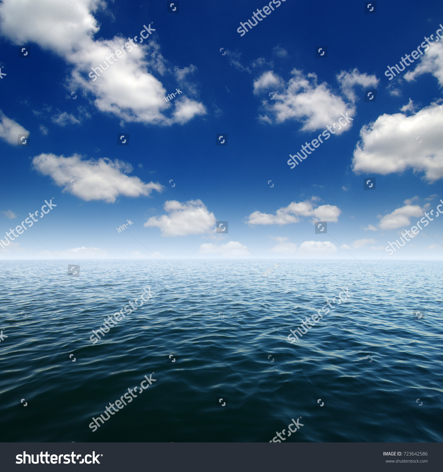 Blue sea water surface on sky #723642586