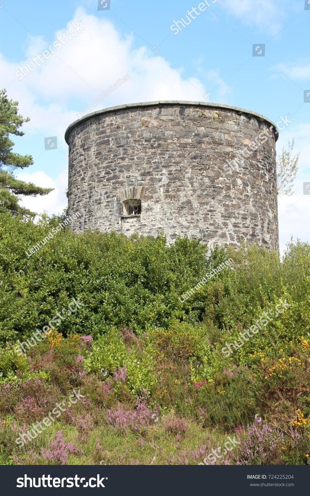 Old stone tower with barred window, Ireland. #724225204