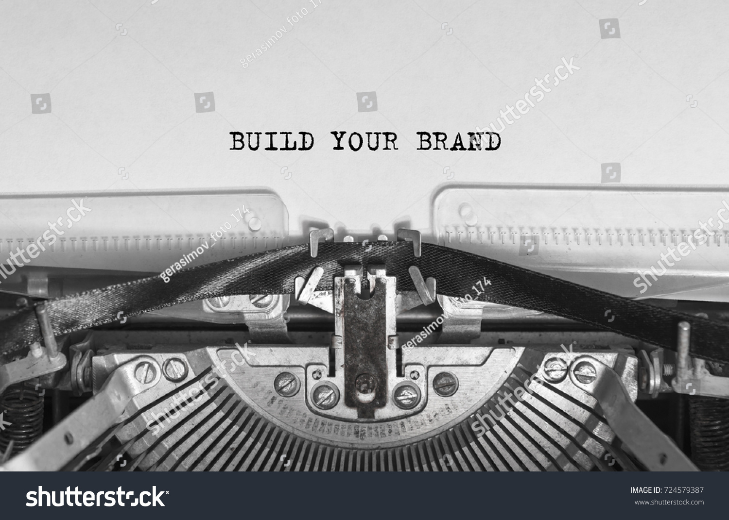 BUILD YOUR BRAND typed words on a vintage typewriter #724579387