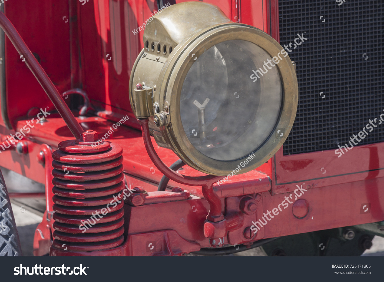 Kerosene lamp, old brass car headlight in oldtimer #725471806