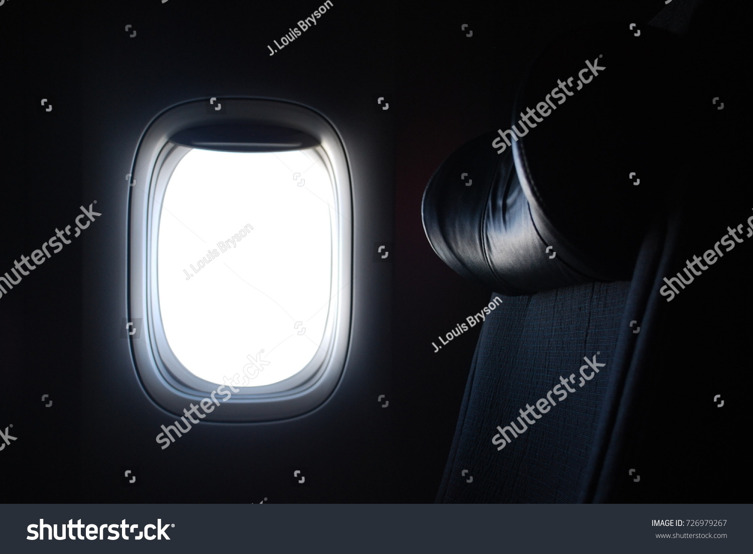 Window View From Passenger Seat On Commercial Airplane #726979267