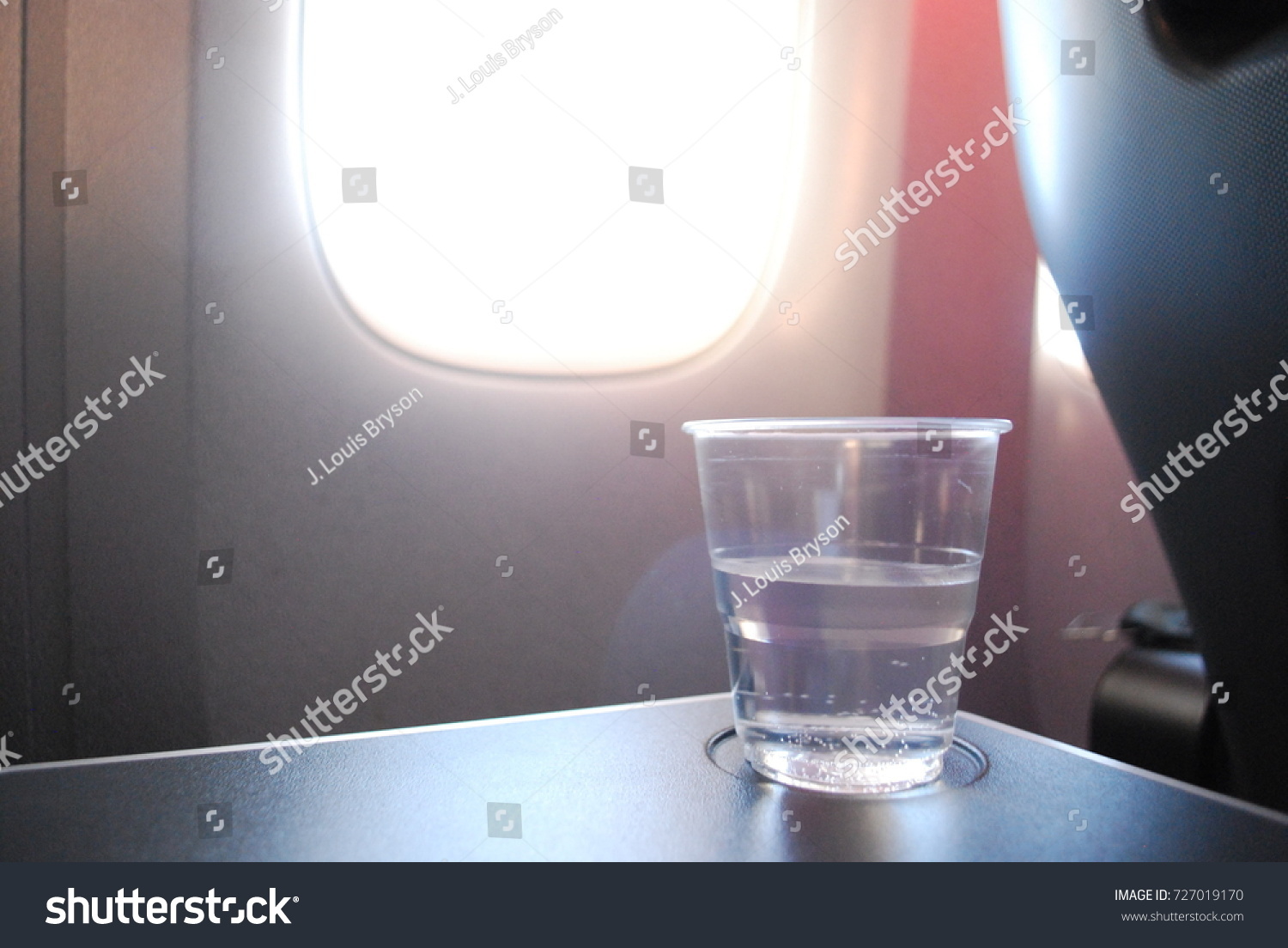 Cup Of Water In Airplane, Travel #727019170