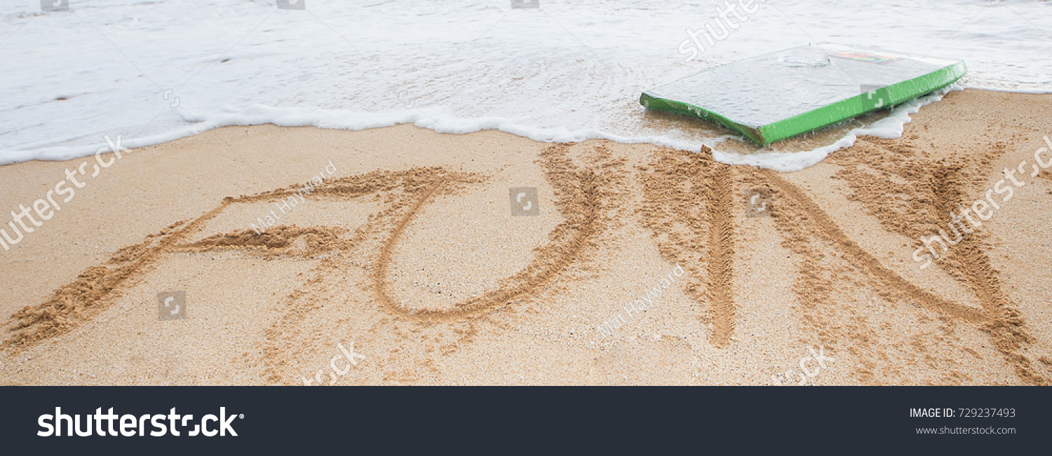 The word fun written in sand at the beach #729237493