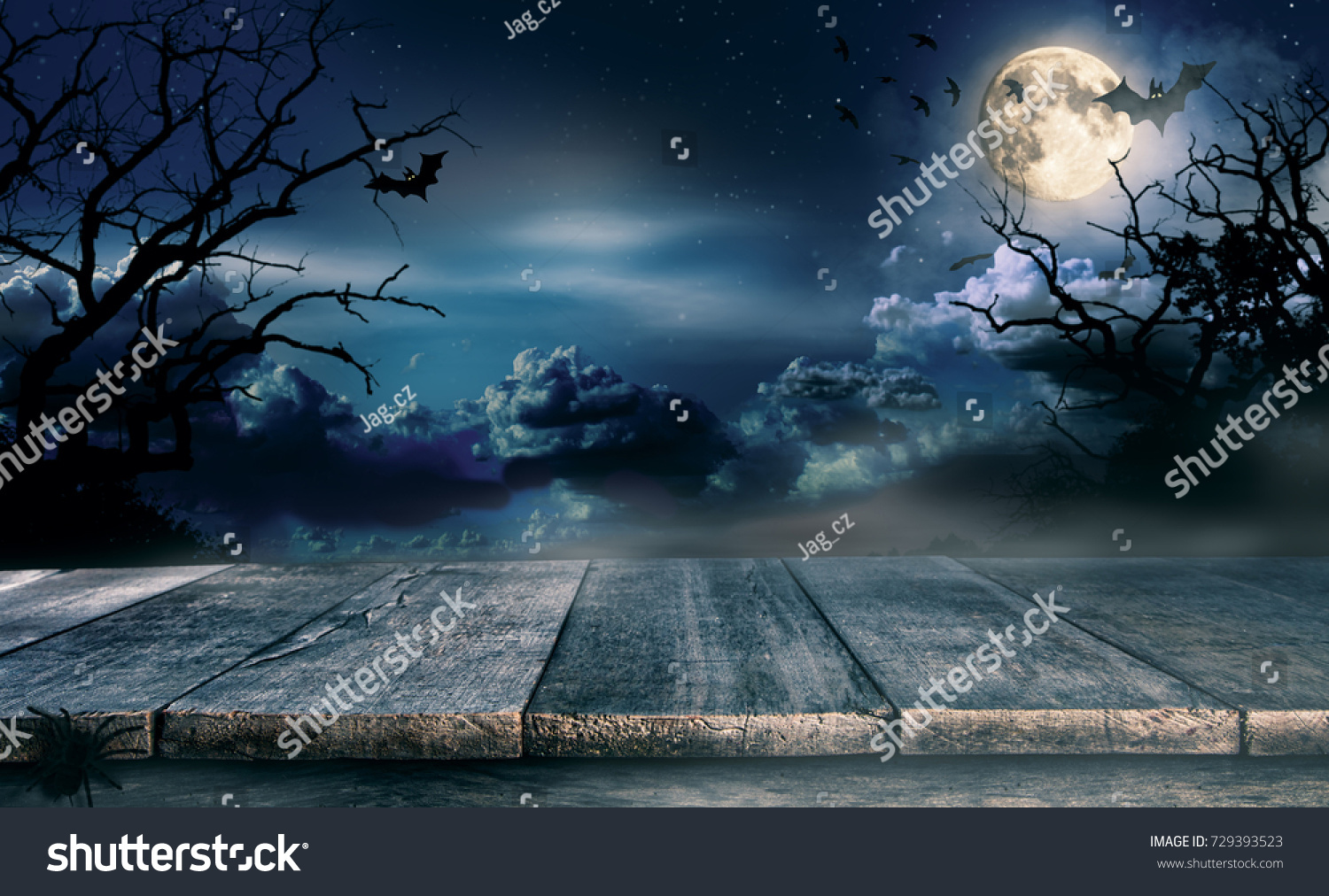 Spooky halloween background with empty wooden planks, dark horror background. Celebration theme, copyspace for text. Ideal for product placement #729393523