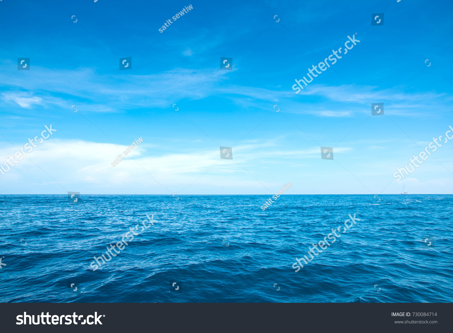 Calm Sea and Blue Sky Background. #730084714