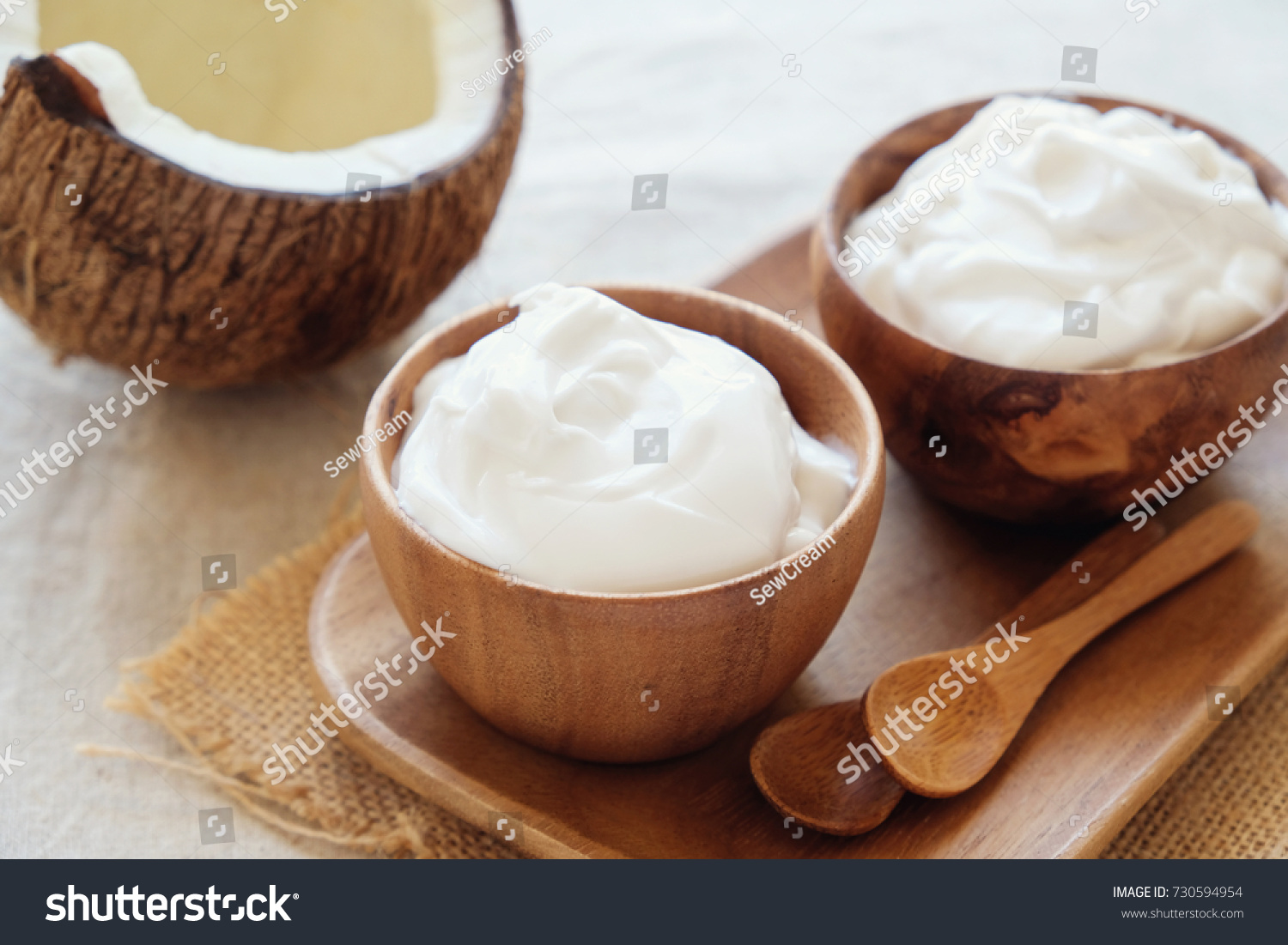 organic coconut yogurt in wooden bowl, dairy free yogurt, probiotic food, gut health, keto, ketogenic, low carb diet, sugar free,  gluten free dessert #730594954