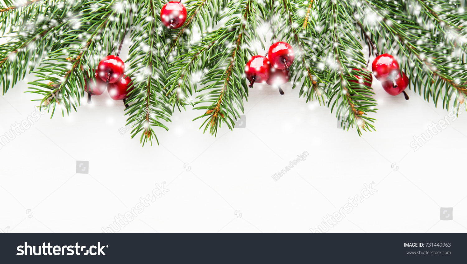 Christmas background with xmas tree, red berries on white wooden background. Merry christmas greeting card, frame, banner. Winter holiday theme. Happy New Year. Space for text. Flat lay. Snow effect. #731449963