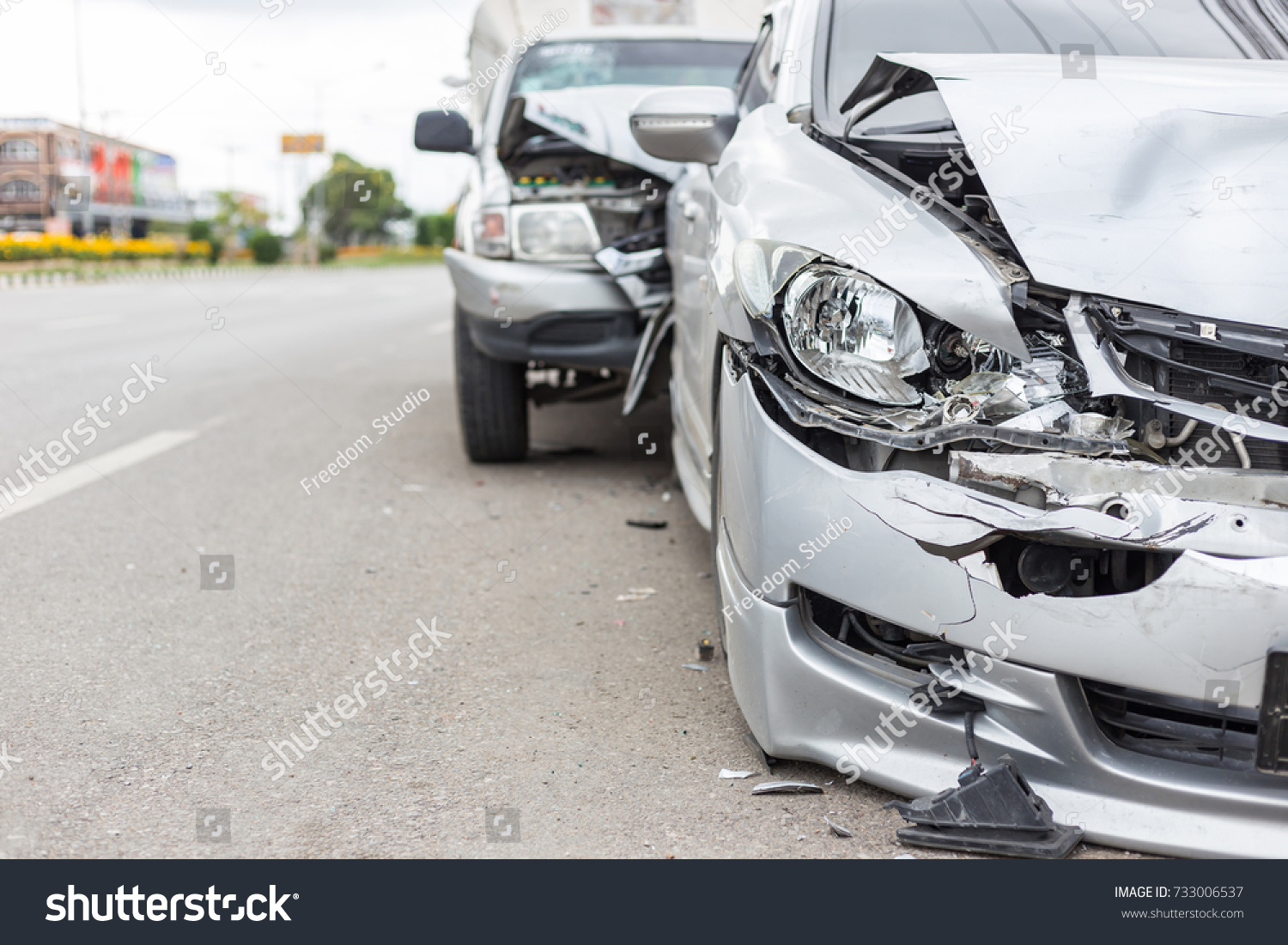 Modern car accident involving two cars on the road in Thailand #733006537