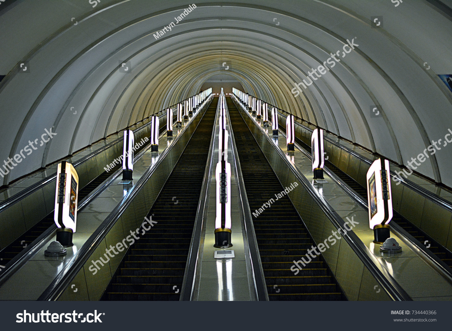  Long escalators at one of the deep metro stations - Kyiv (Kiev) Metro #734440366