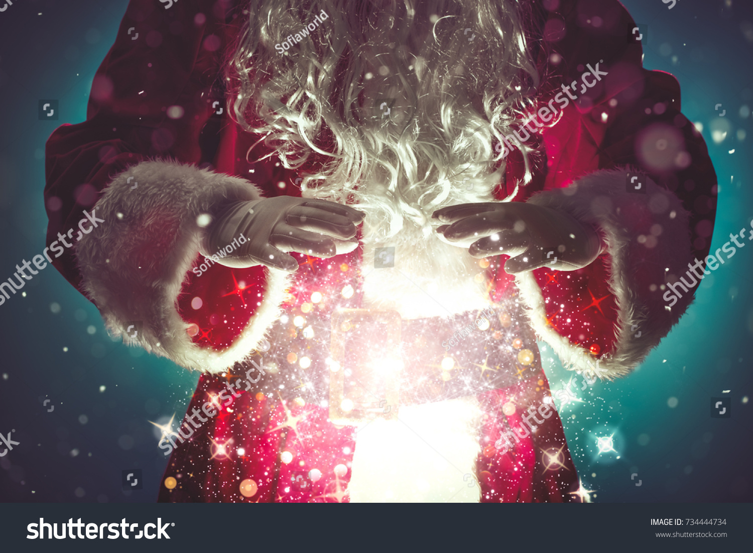 Santa Claus with magic Christmas lights,Christmas concept #734444734