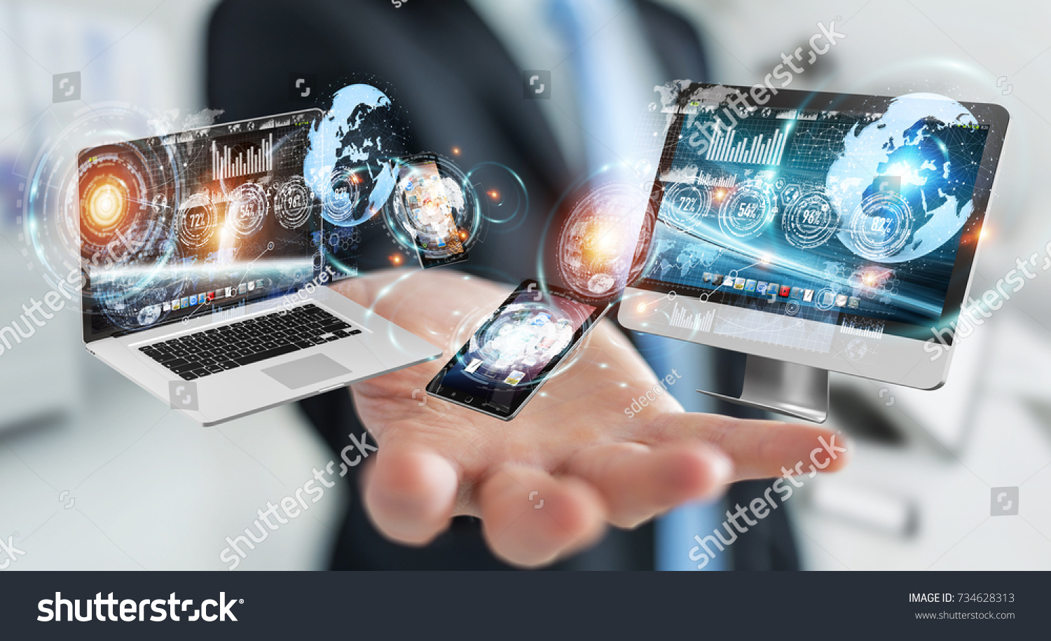 Businessman on blurred background connecting tech devices 3D rendering #734628313
