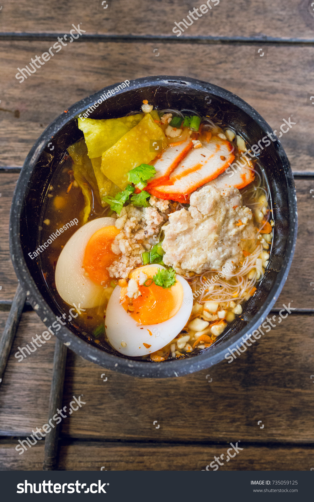 Thai traditional noodle with eggs in coconut shell  #735059125