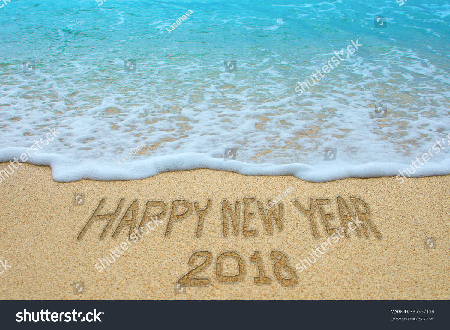Happy new year 2018 written on sandy beach, New Year 2018 is coming concept. #735377119