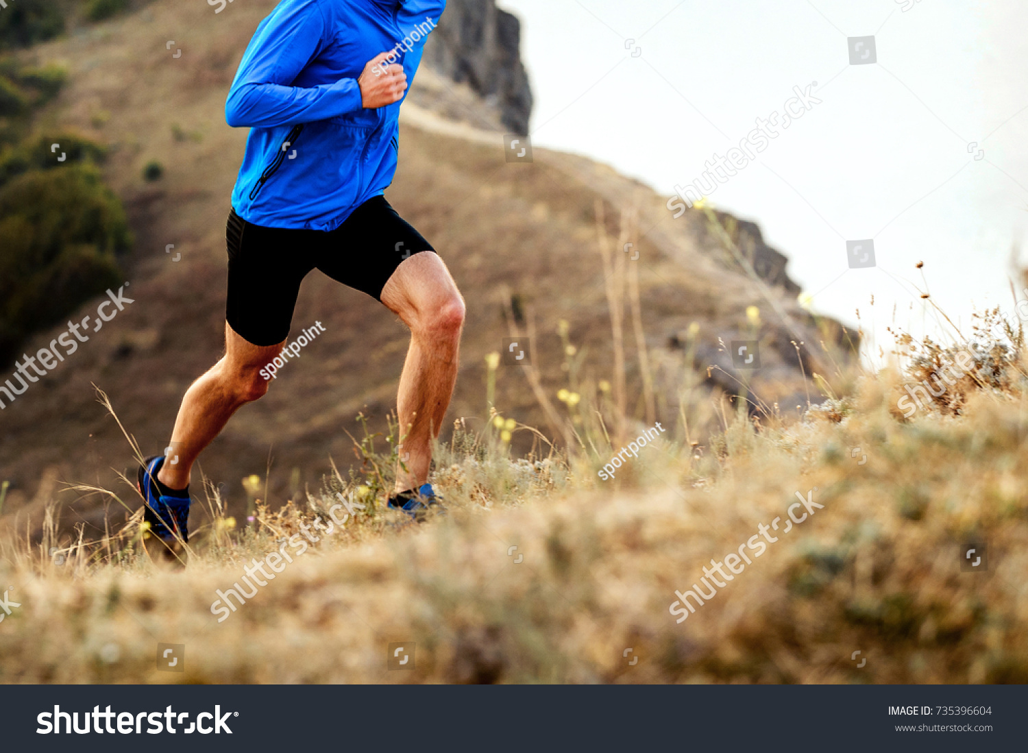 mountain marathon running uphill athlete men runner #735396604