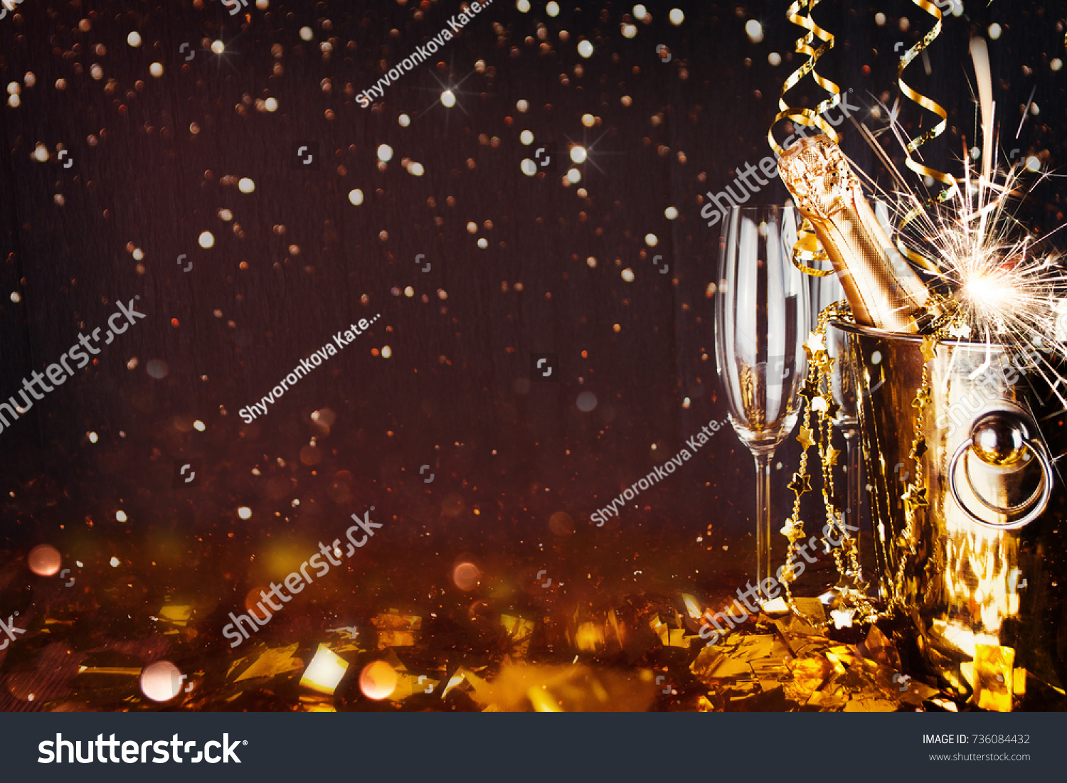 Sparkling New Year background. Champagne Explosion With Toast Of Flutes #736084432