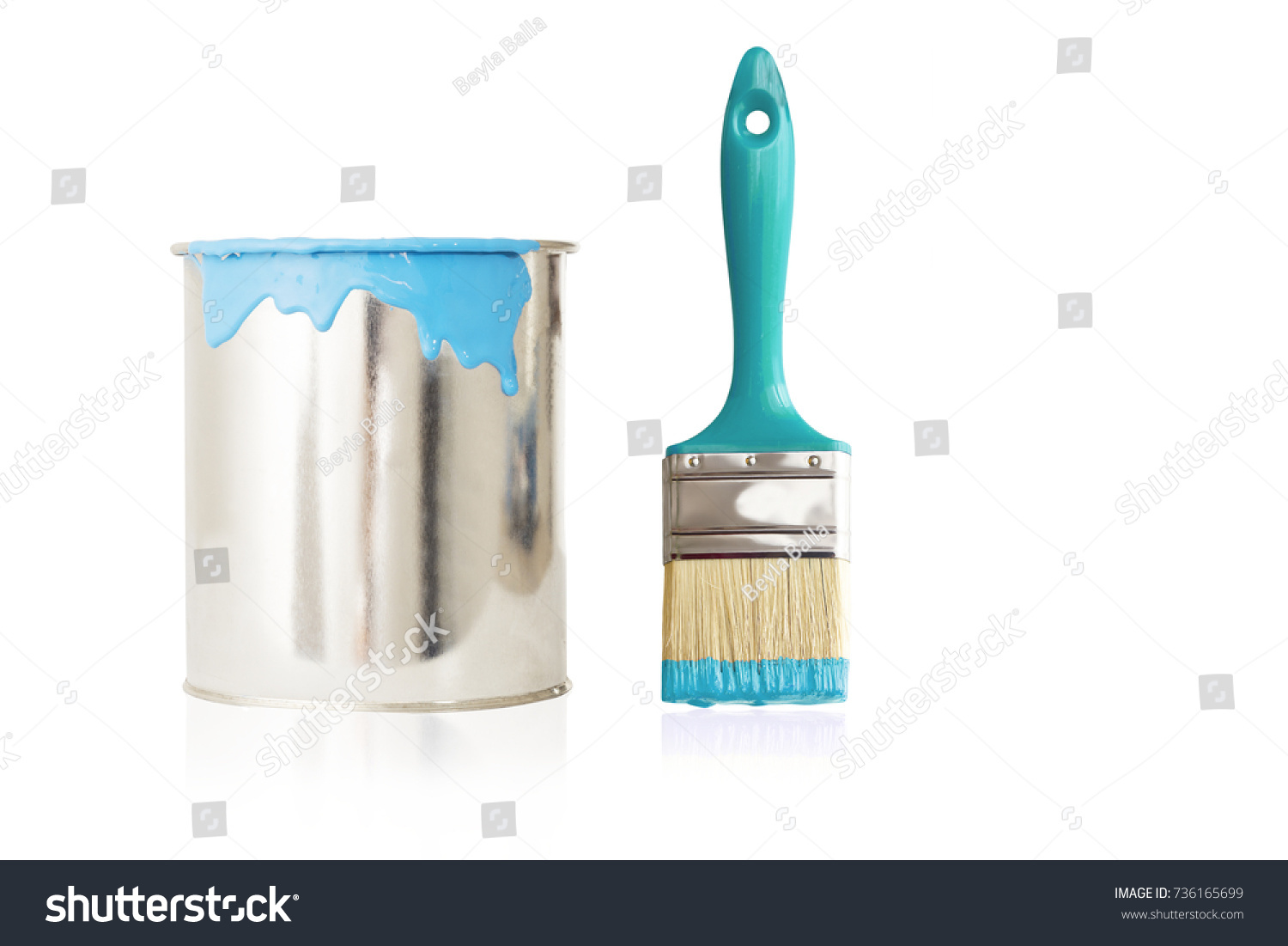 open, painted bucket and paintbrush on a white backdrop. #736165699