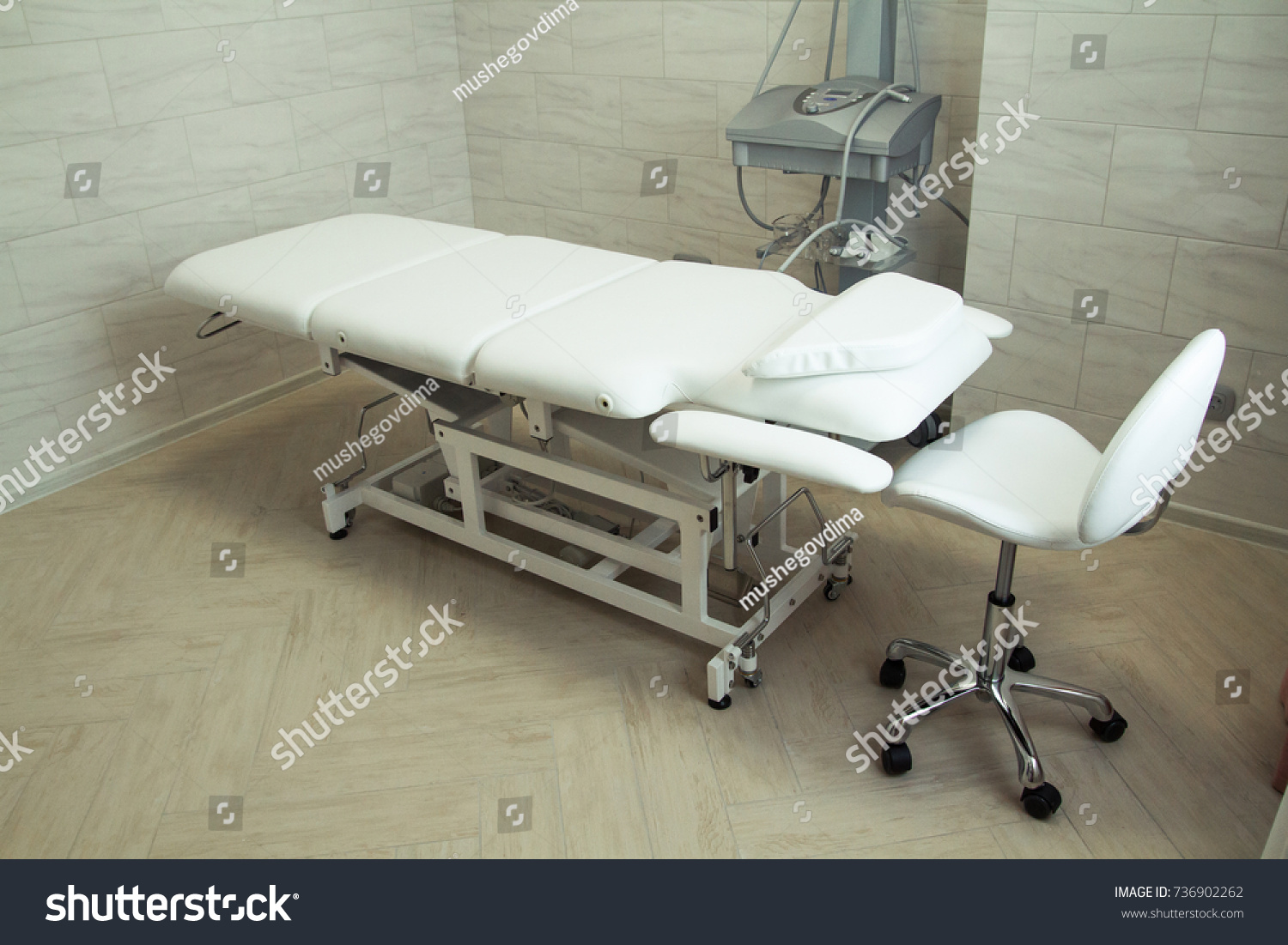 beauty parlor with a couch and equipment for face #736902262