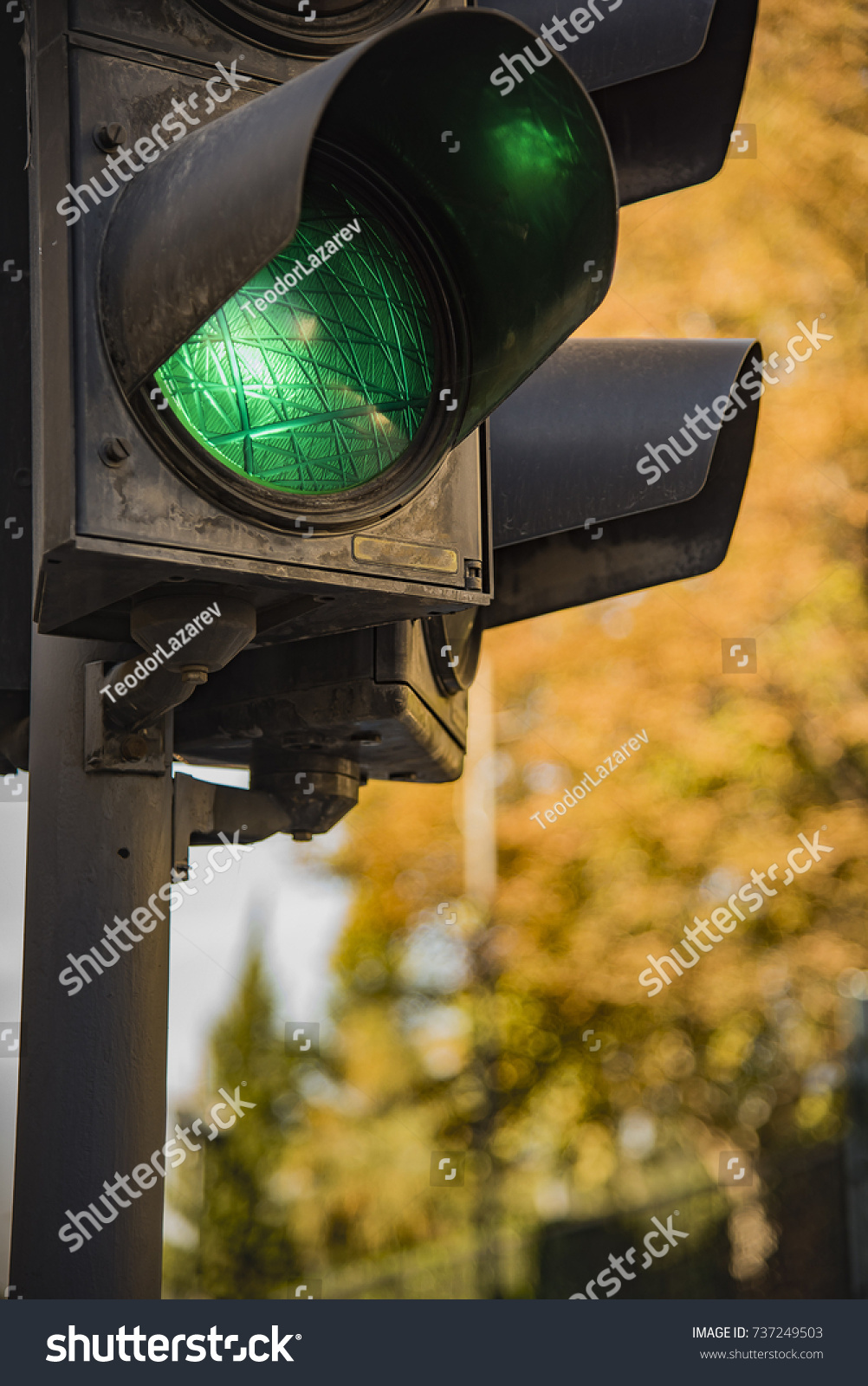Traffic light showing green, signaling drivers to go #737249503