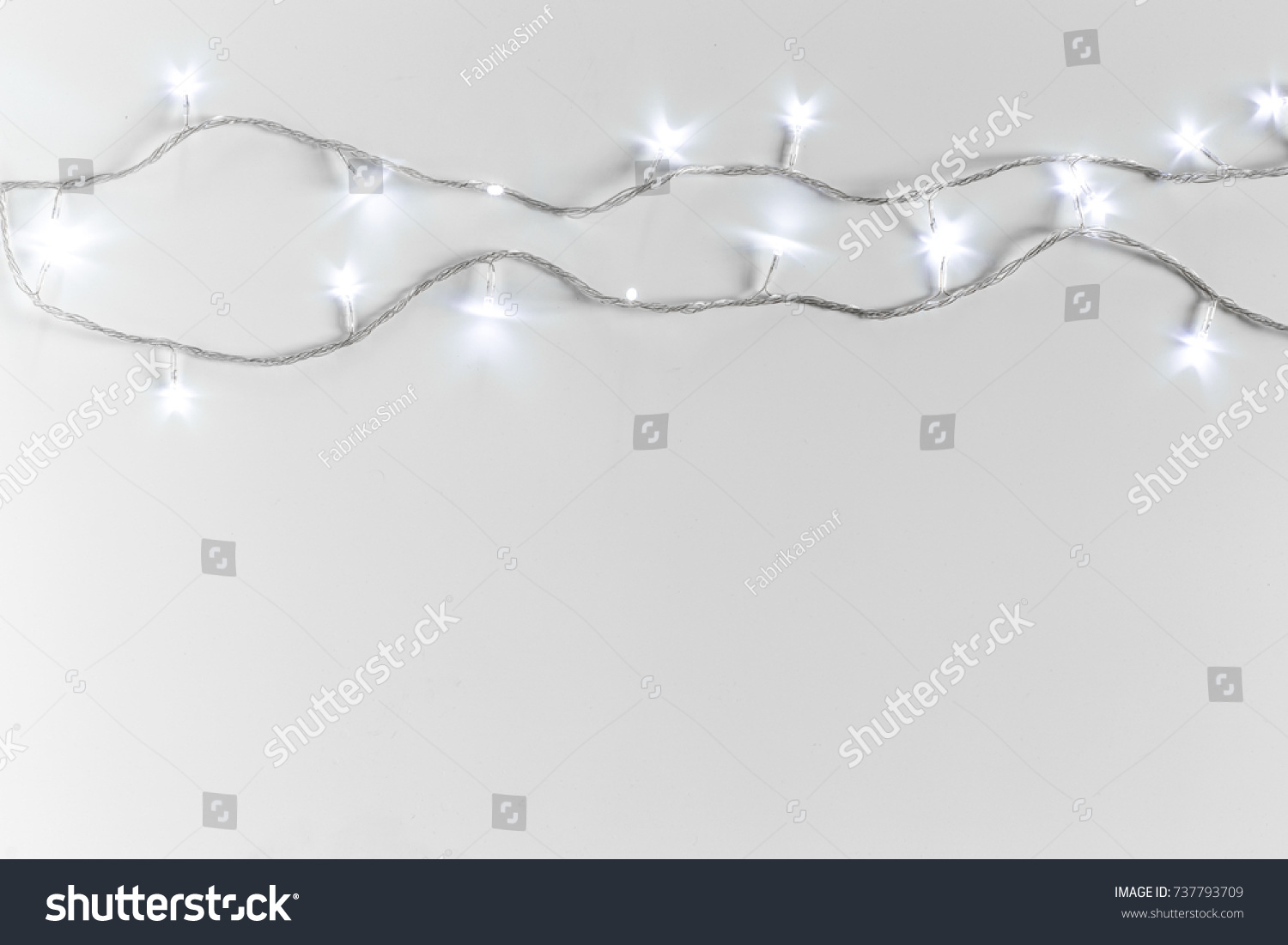 Christmas lights isolated on white background #737793709